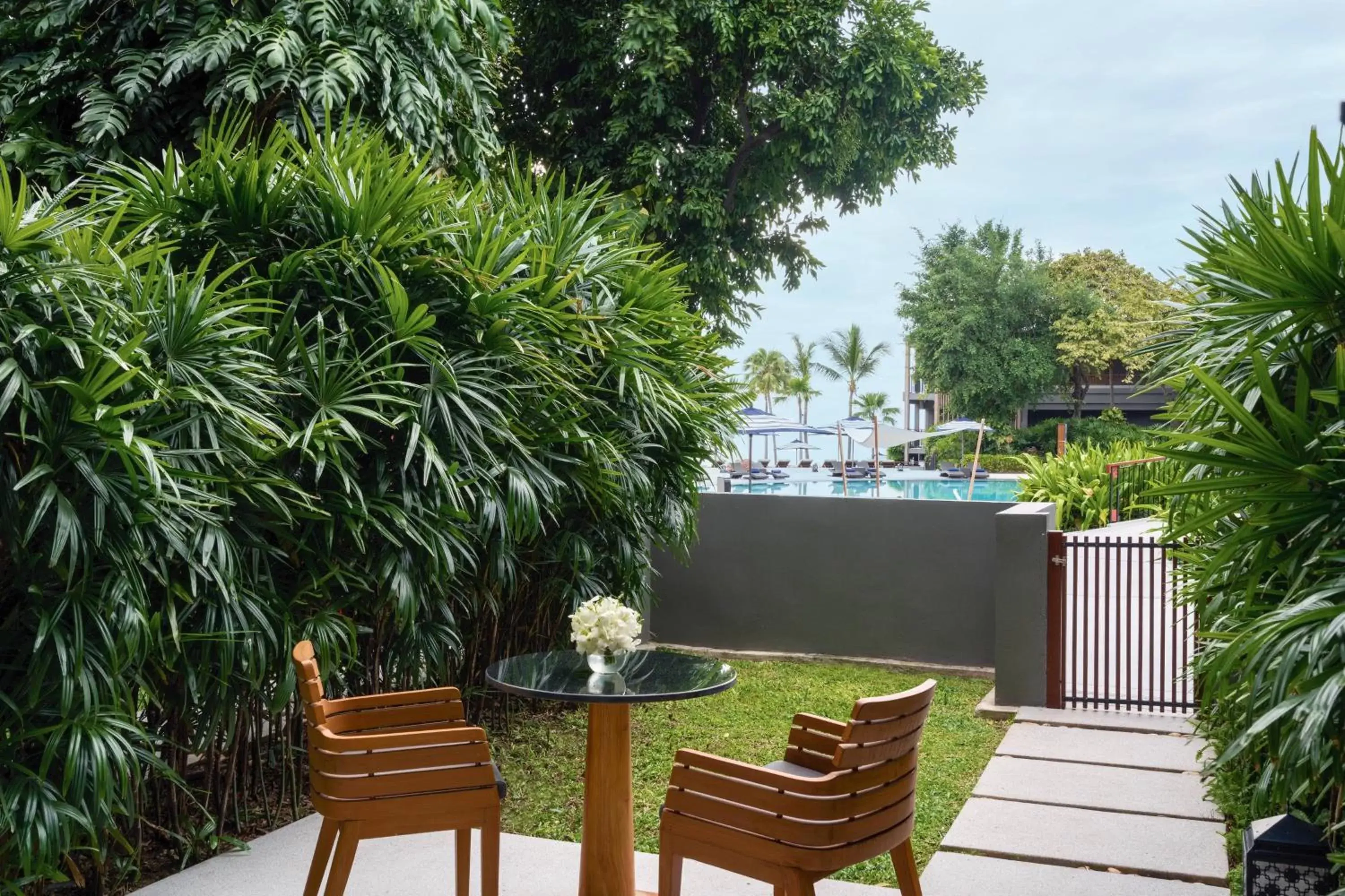 Swimming pool, Garden in Hua Hin Marriott Resort and Spa