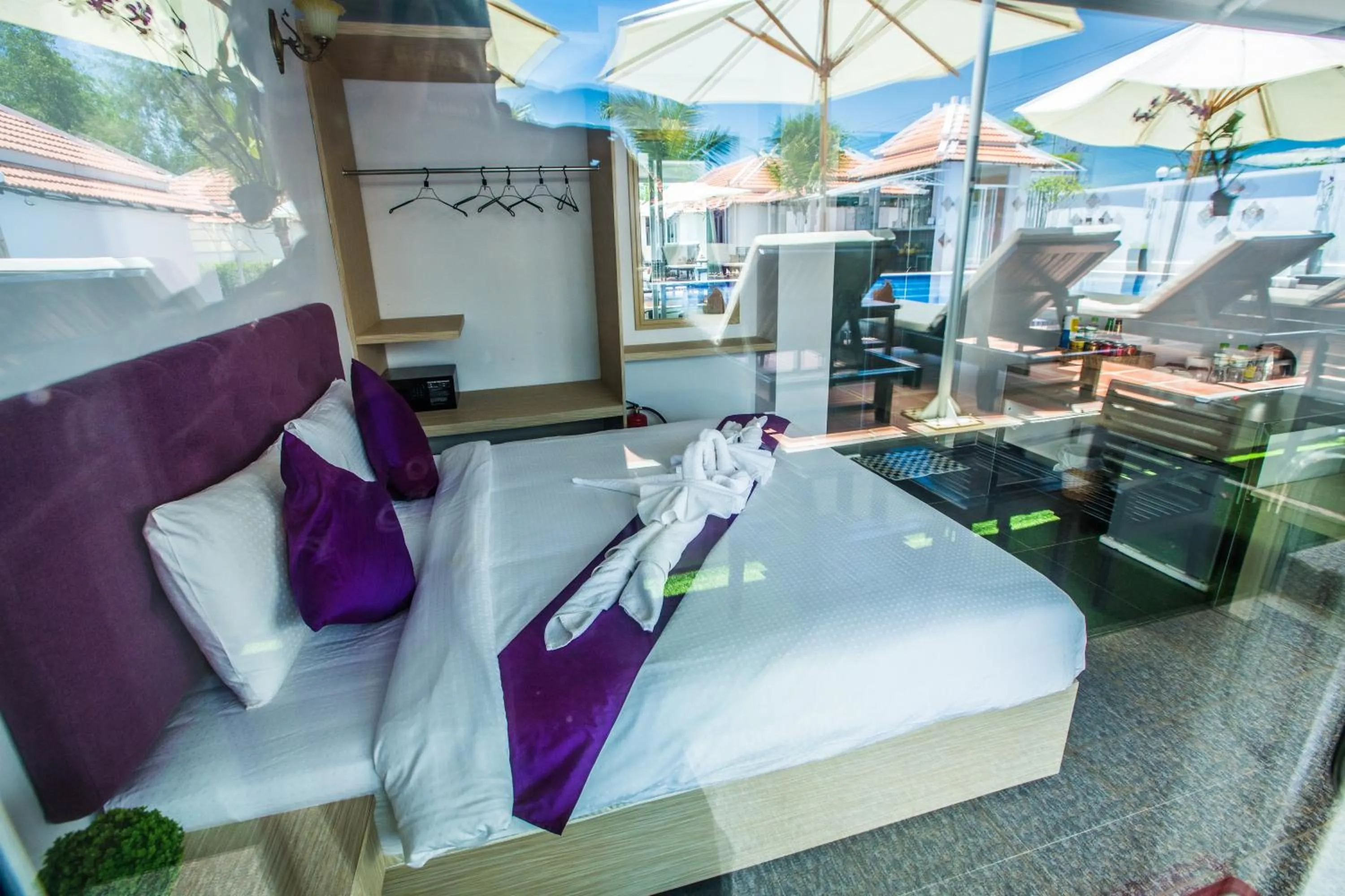 Pool view, Bed in Good Time Resort