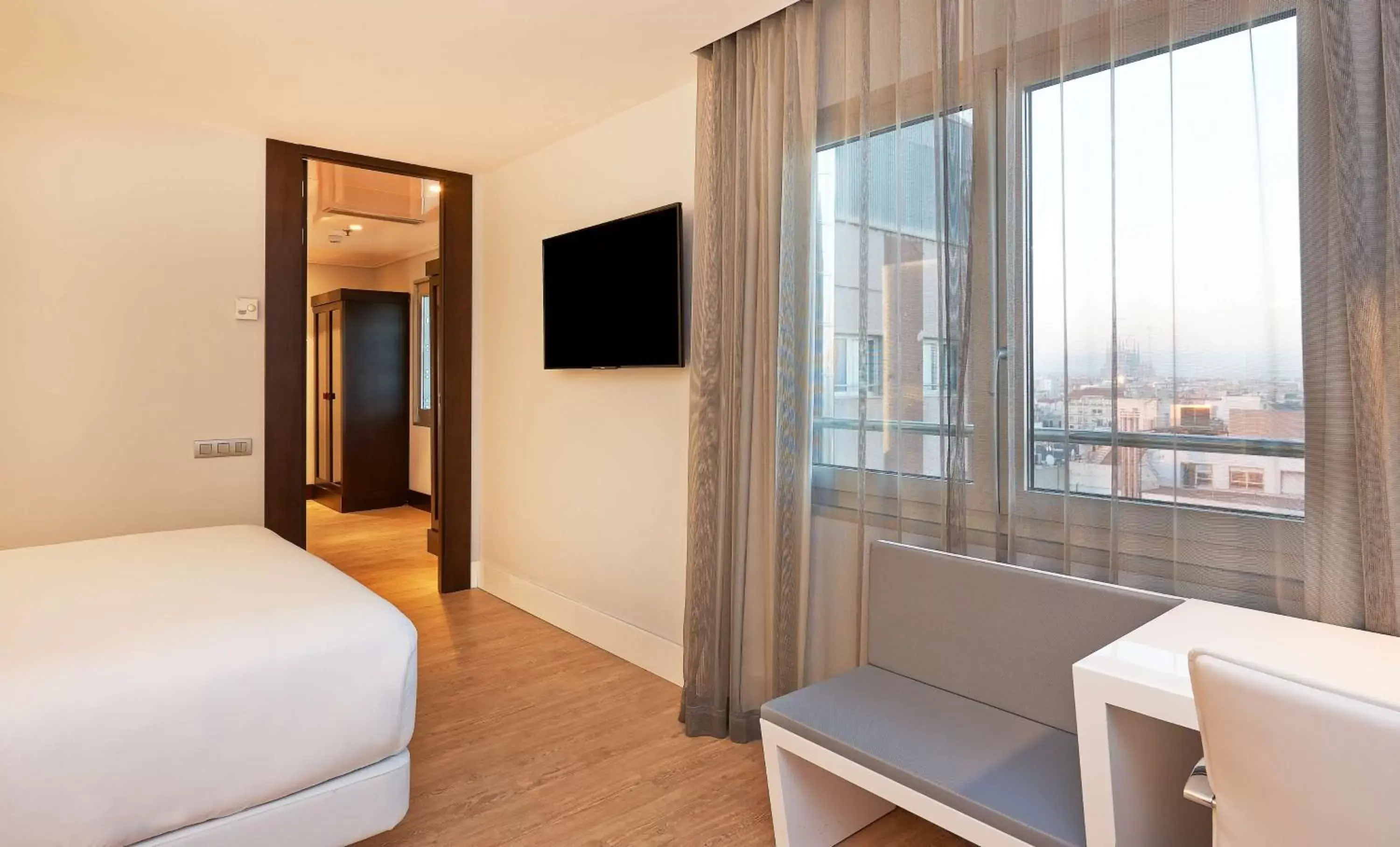 Photo of the whole room, TV/Entertainment Center in NH Collection Barcelona Gran Hotel Calderon