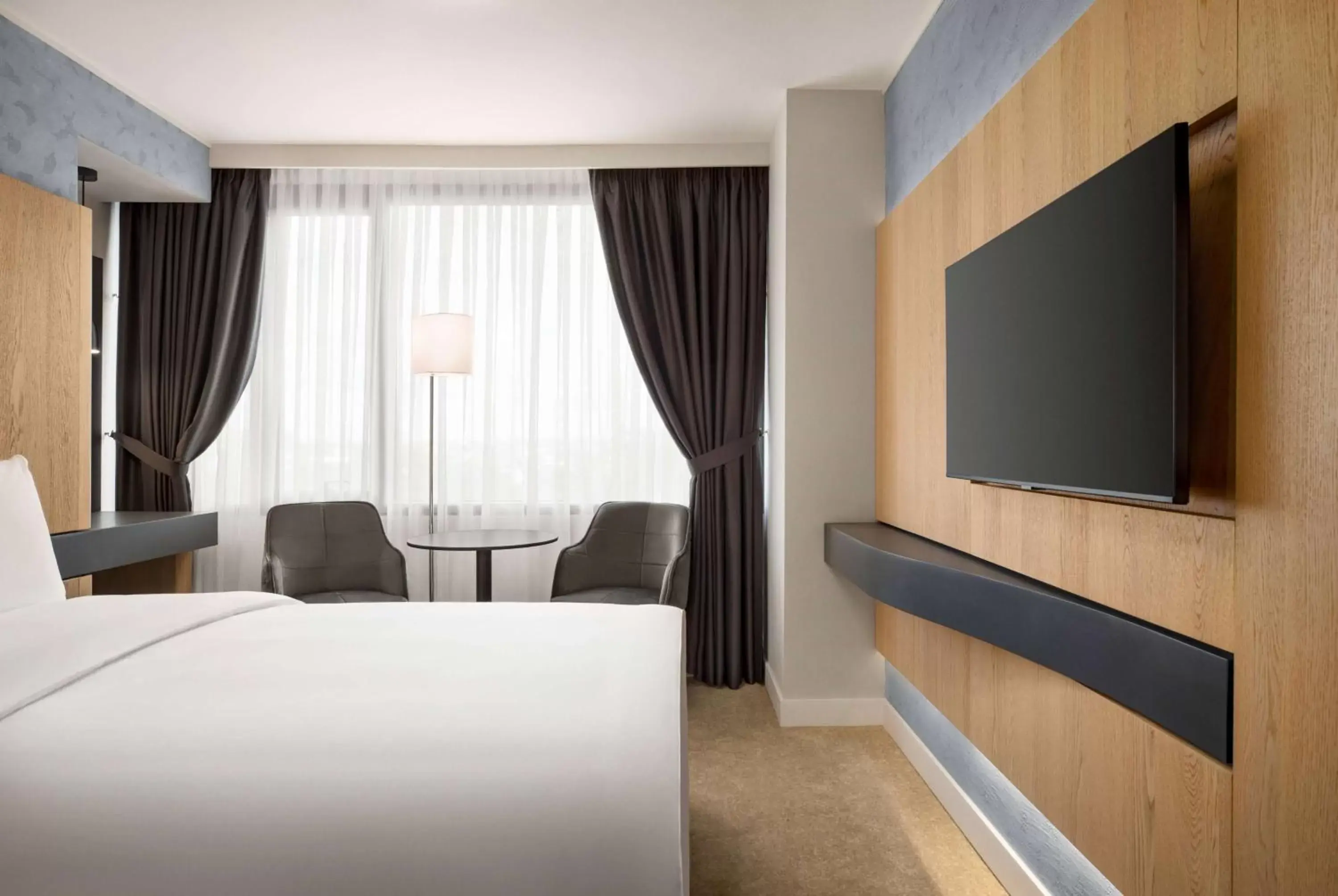 Bed in Ramada by Wyndham Slatina Parc