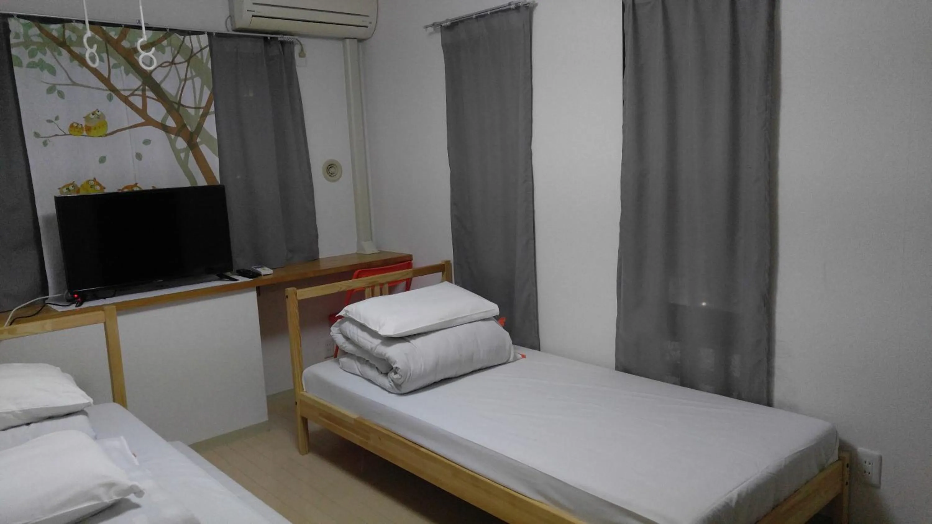 Bed in Sophiearth Apartment