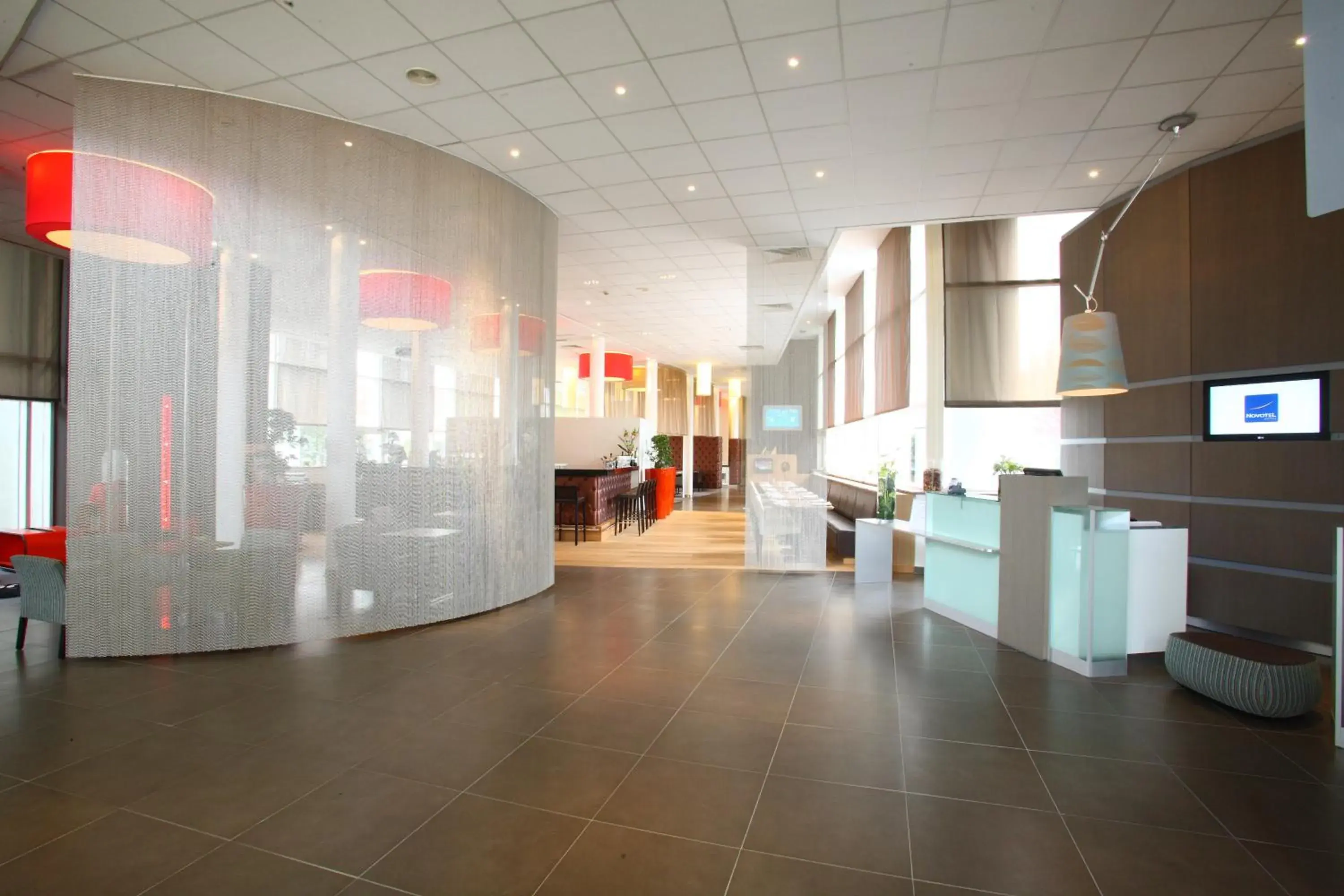 Lobby or reception in Novotel Brugge Centrum