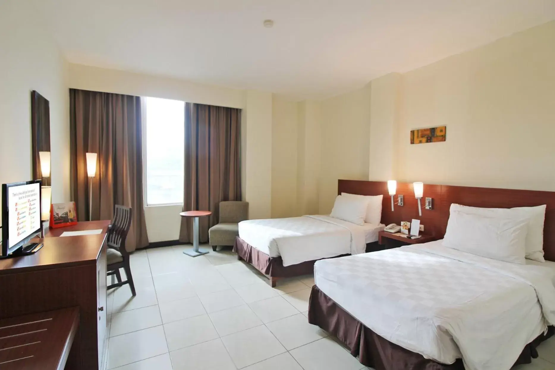 Bed in Swiss-Belhotel Manokwari