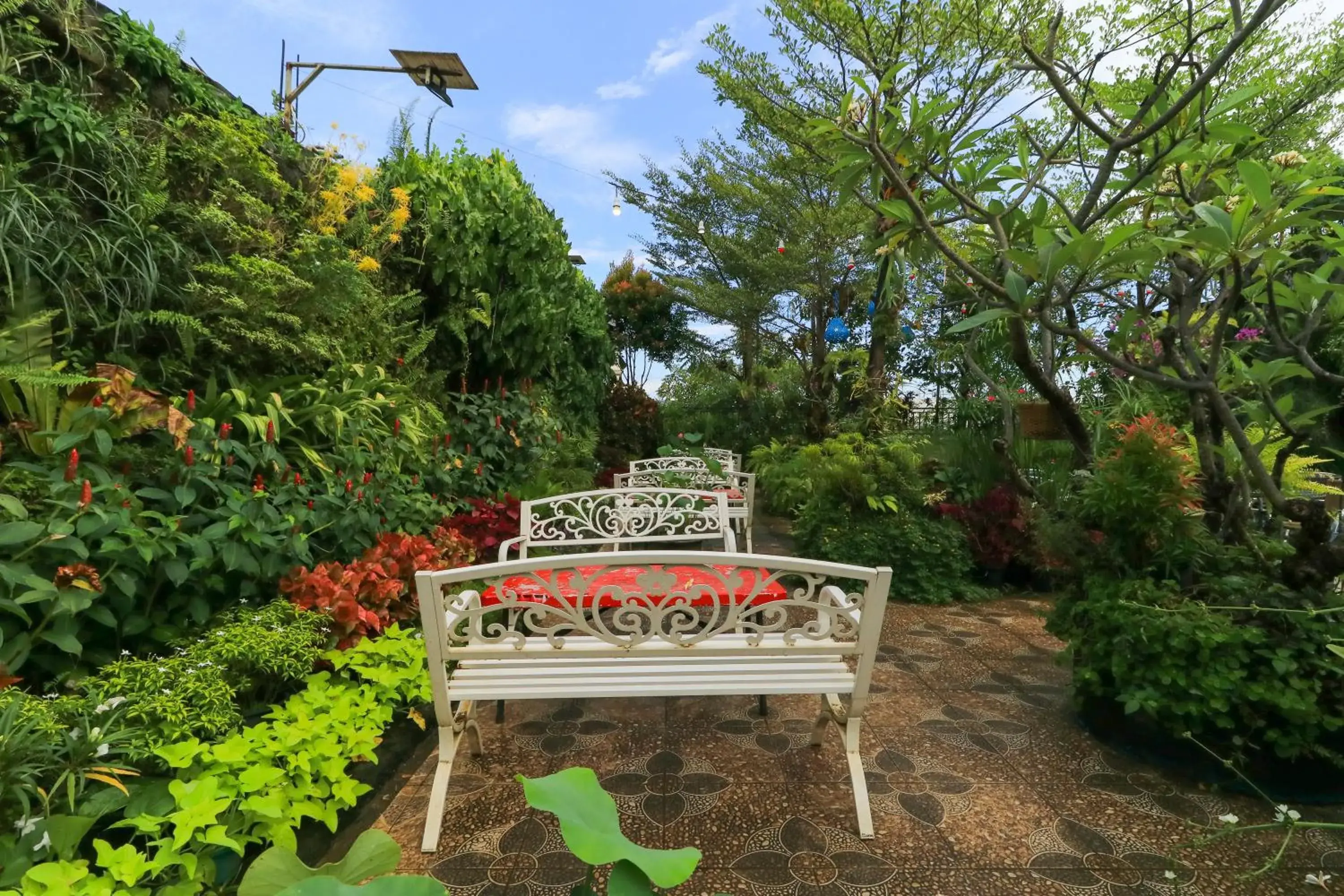 Patio in Labuana Homestay & Cafe Garden by ZUZU