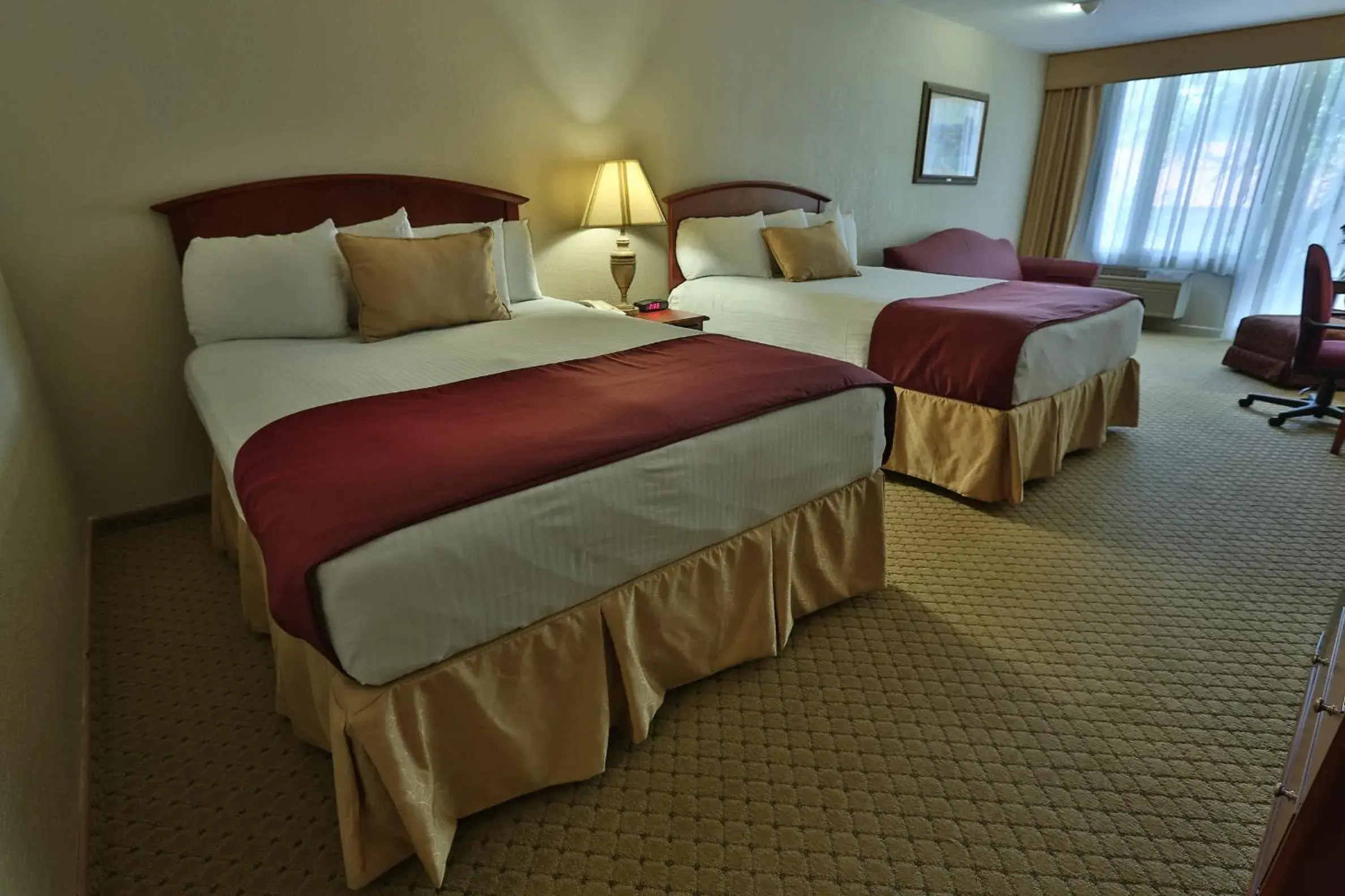 Premium Queen Room with Two Queen Beds in Inn of the Hills Hotel and Conference Center Premium Queen Room with Two Queen Beds in Inn of the Hills Hotel and Conference Center