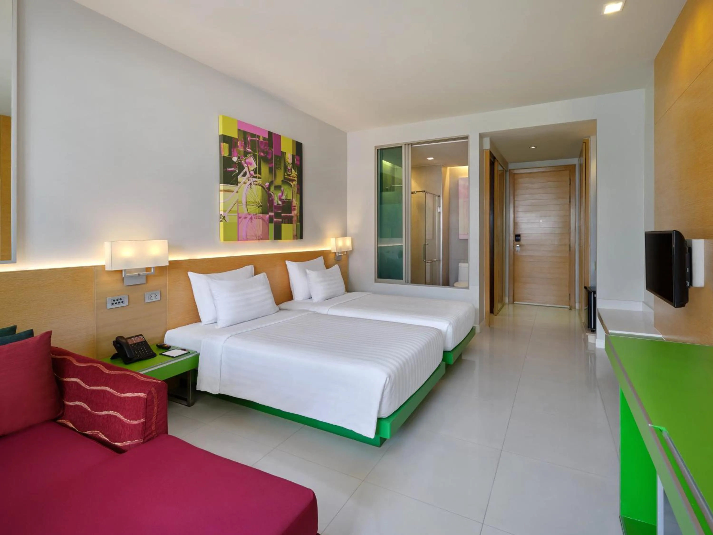 Bed in The Kee Resort & Spa