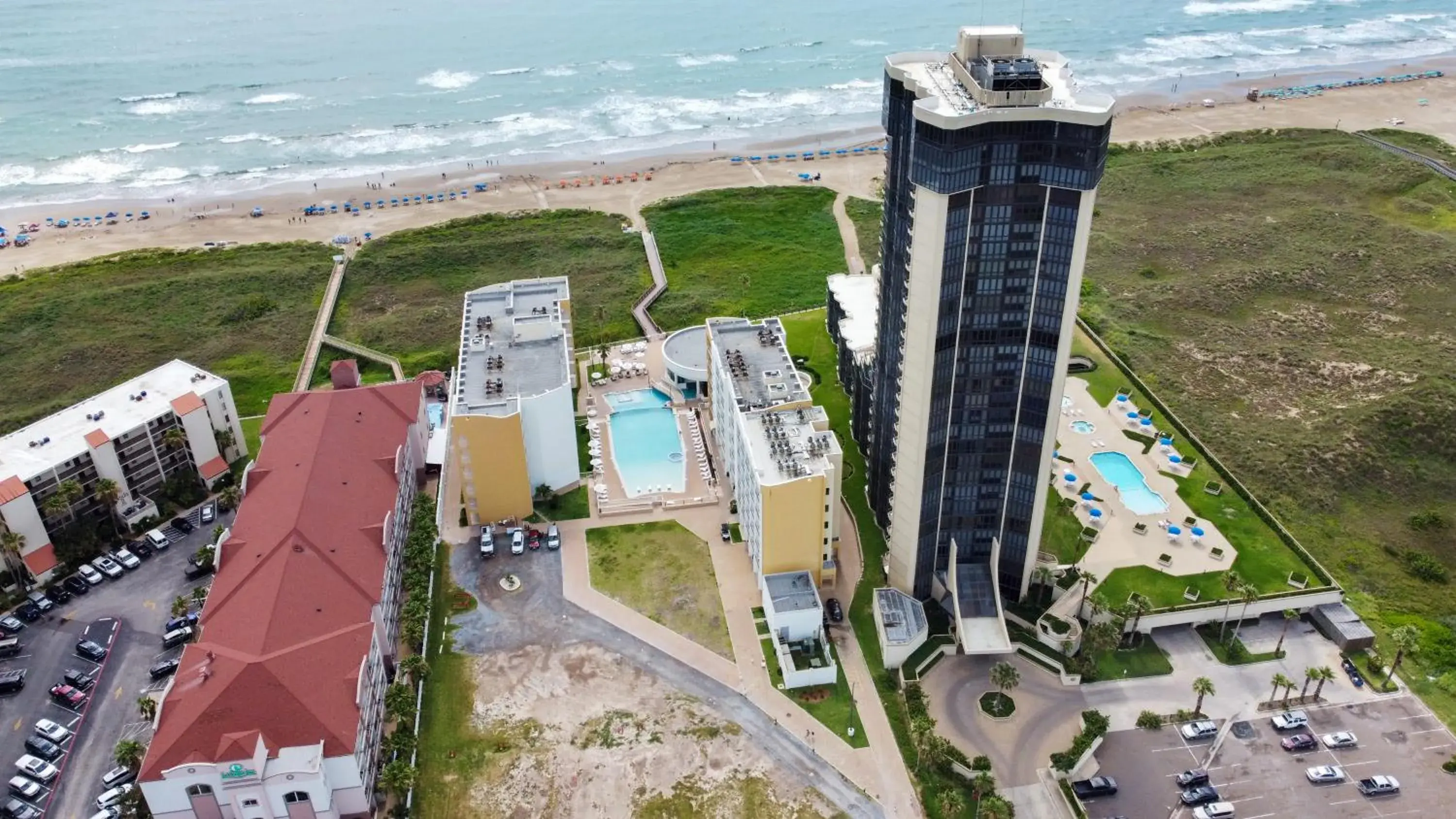 Property building in Peninsula Island Resort & Spa - Beachfront Property at South Padre Island Property building in Peninsula Island Resort & Spa - Beachfront Property at South Padre Island