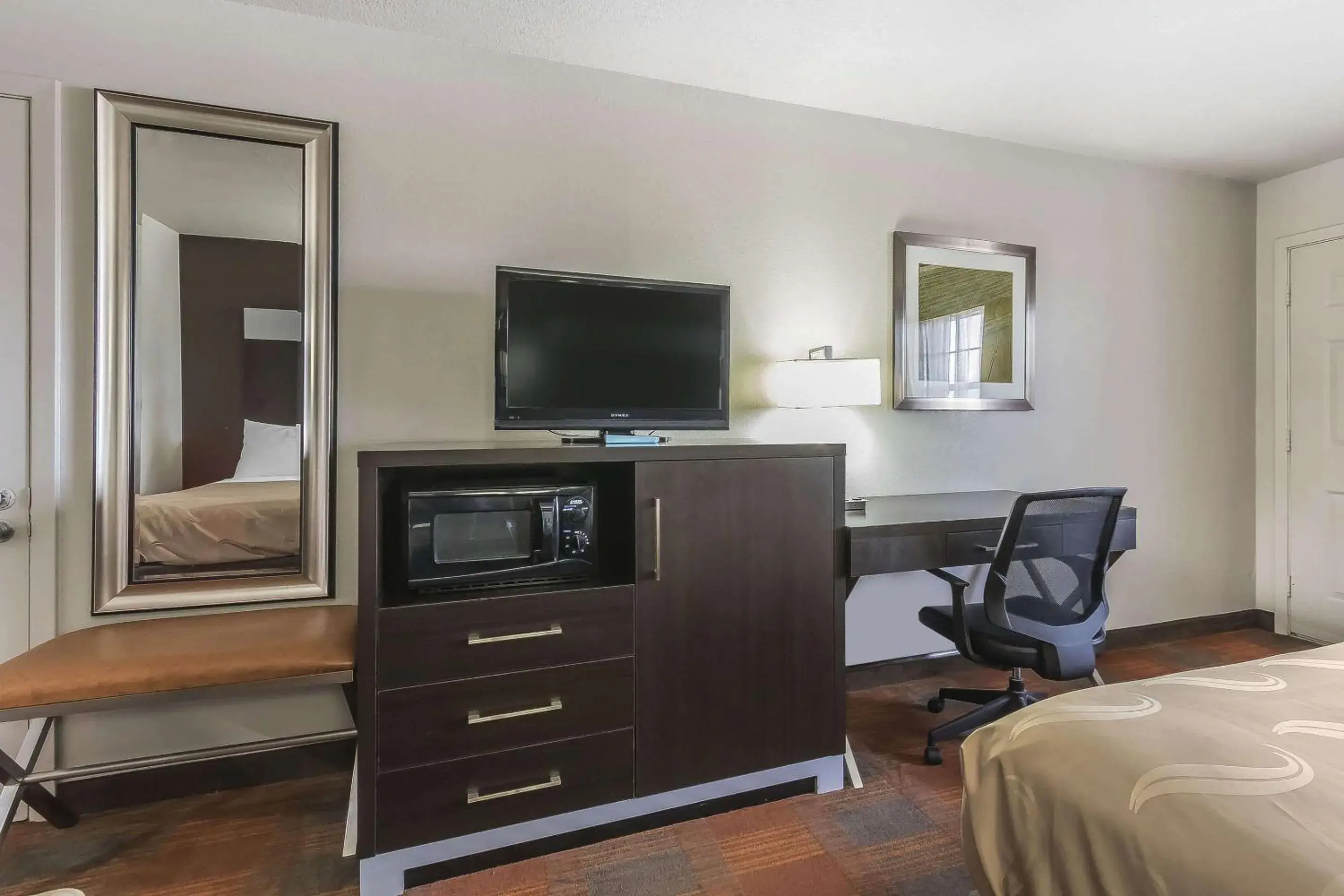 Photo of the whole room, TV/Entertainment Center in Quality Inn & Suites Stuttgart North