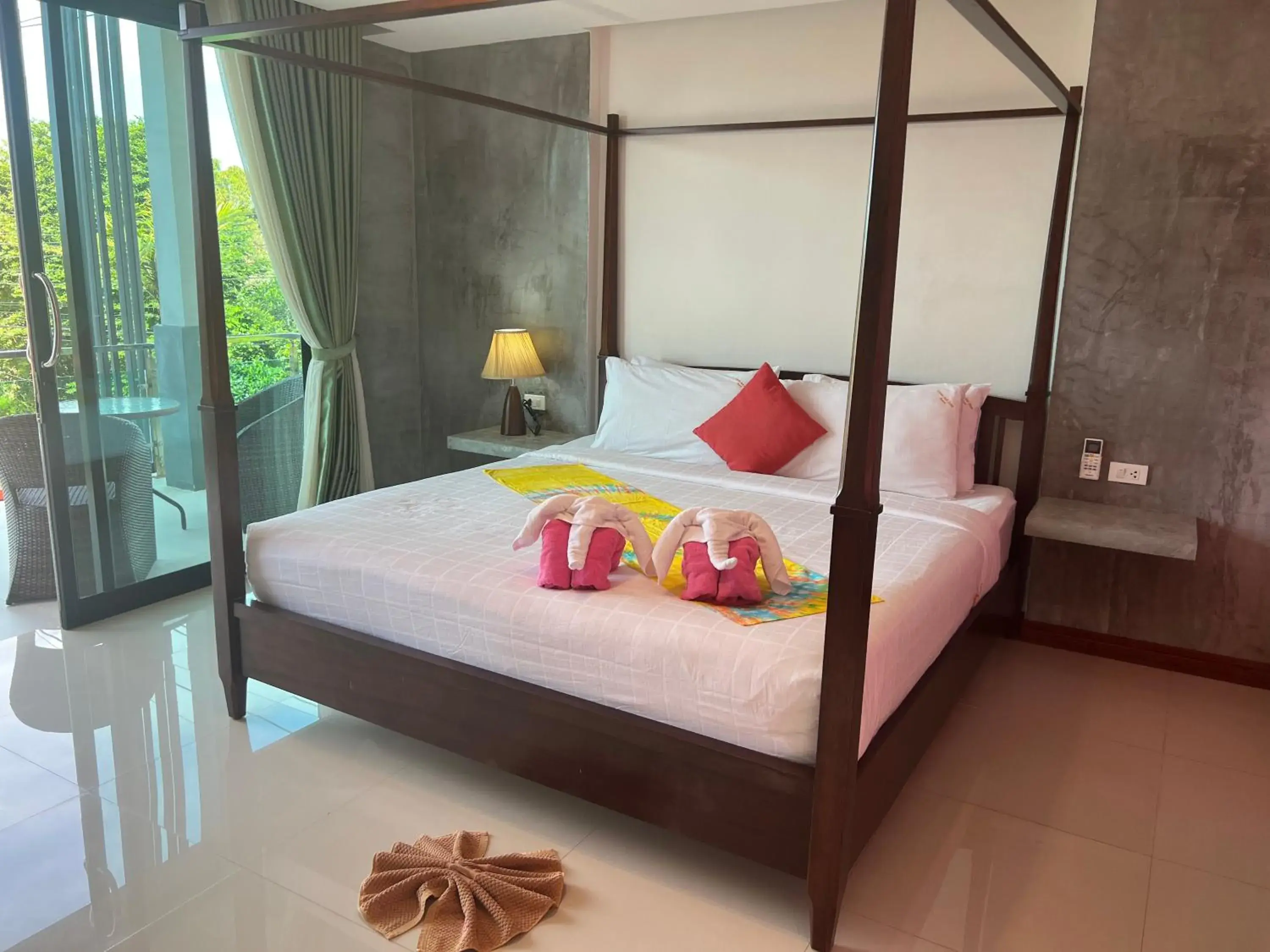 Bed in Pinky Bungalow Resort - SHA Extra Plus