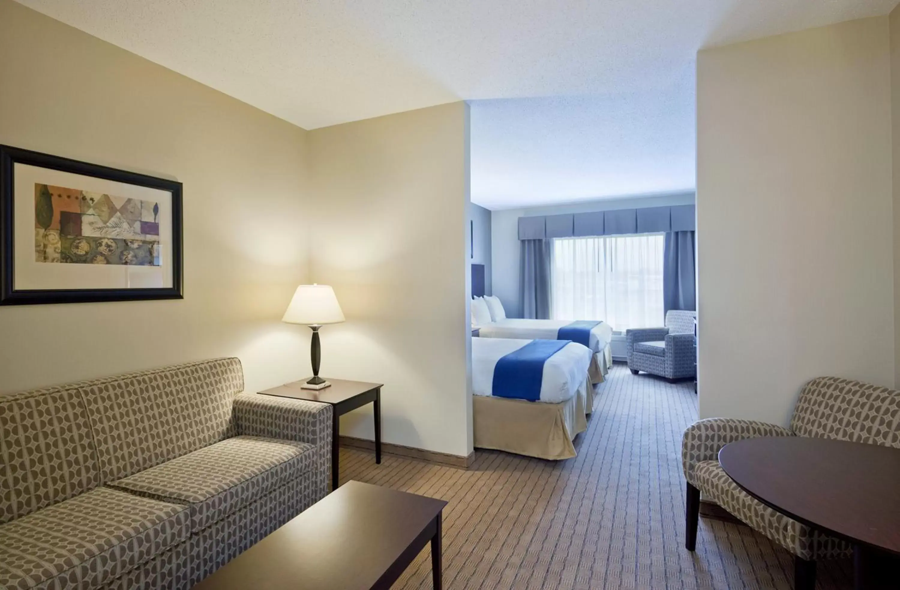 Photo of the whole room, Seating Area in Holiday Inn Express & Suites Malone, an IHG Hotel