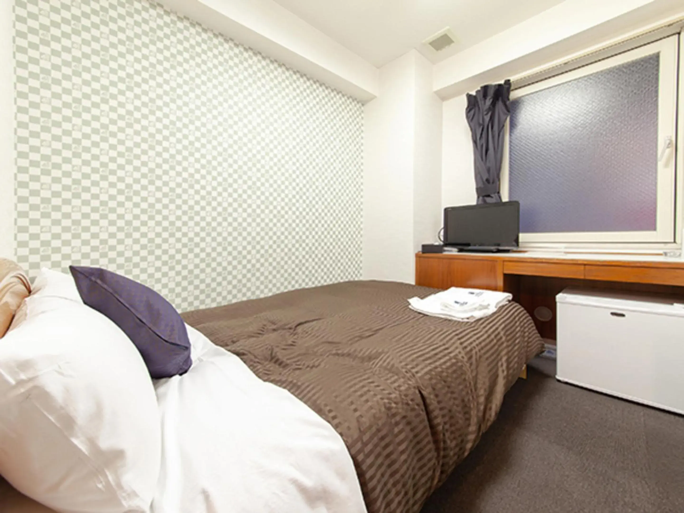 Bed in HOTEL LiVEMAX BUDGET Nippori