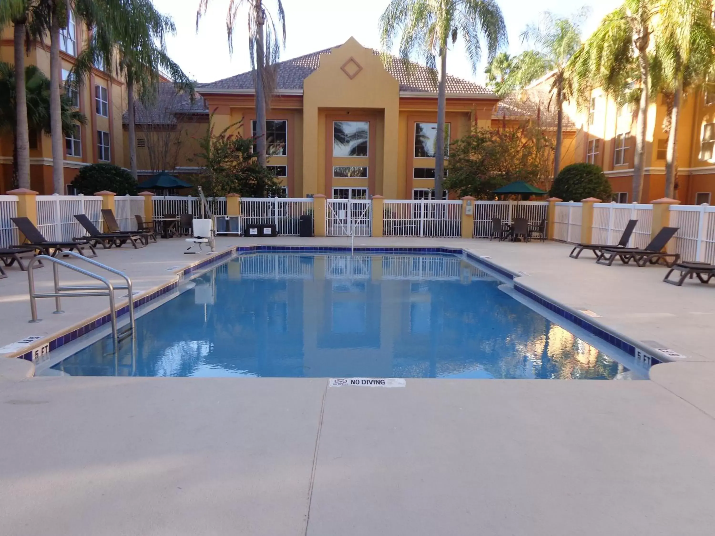 Swimming Pool in SureStay Plus by Best Western Orlando Lake Buena Vista