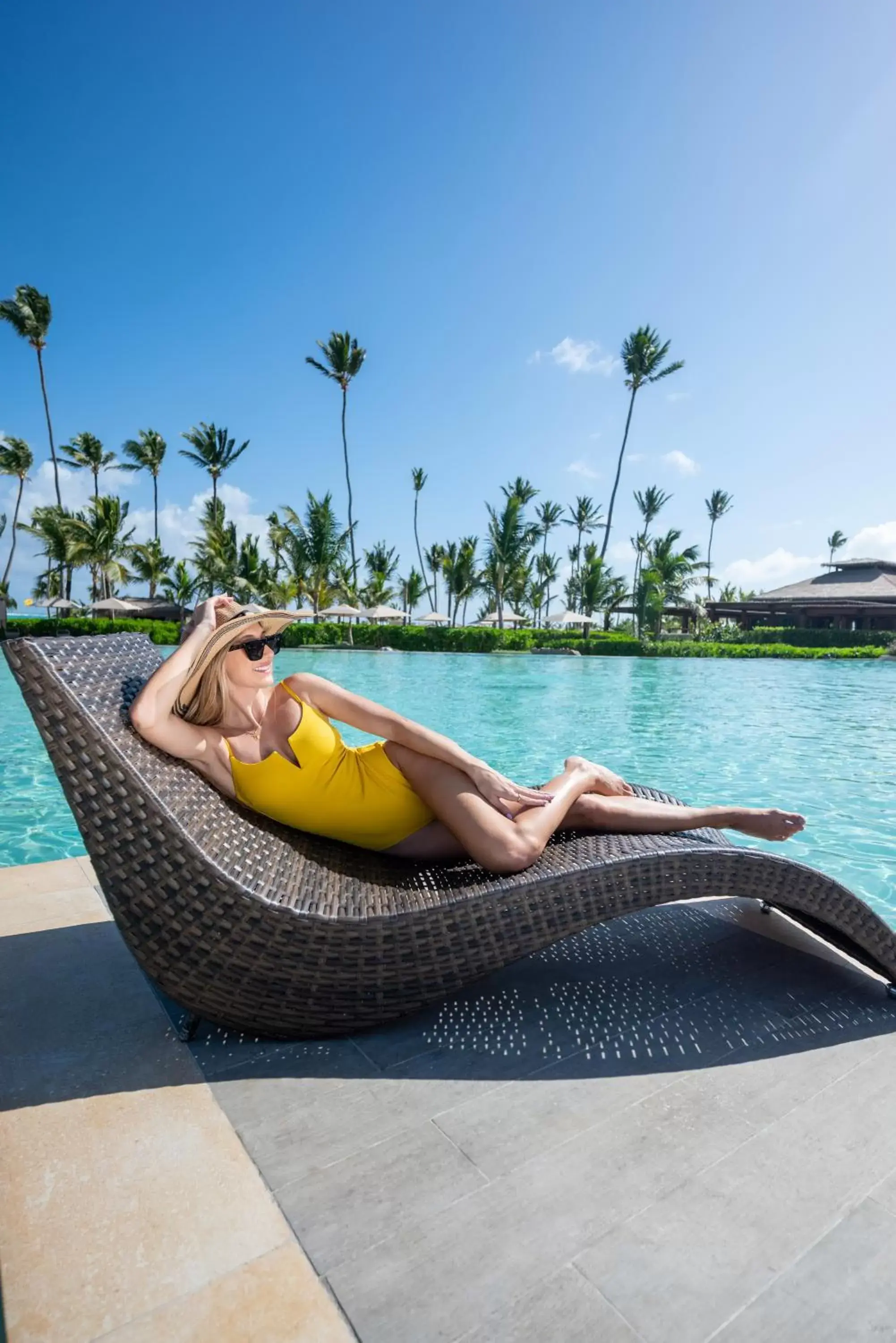 Swimming pool in Unique Club at Lopesan Costa Bávaro Resort Swimming pool in Unique Club at Lopesan Costa Bávaro Resort