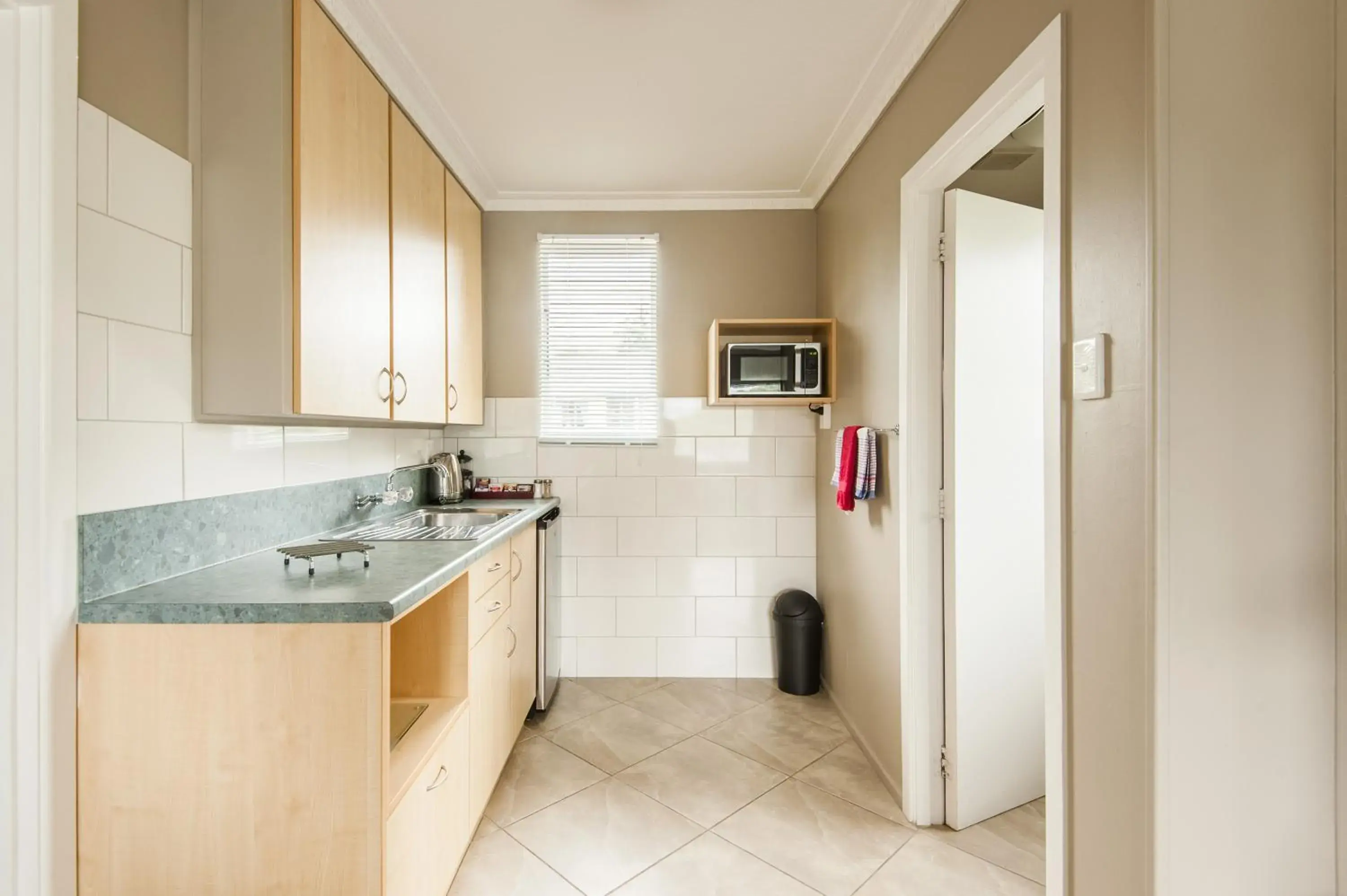 Kitchen or kitchenette, Kitchen/Kitchenette in Manuka Crescent Motel