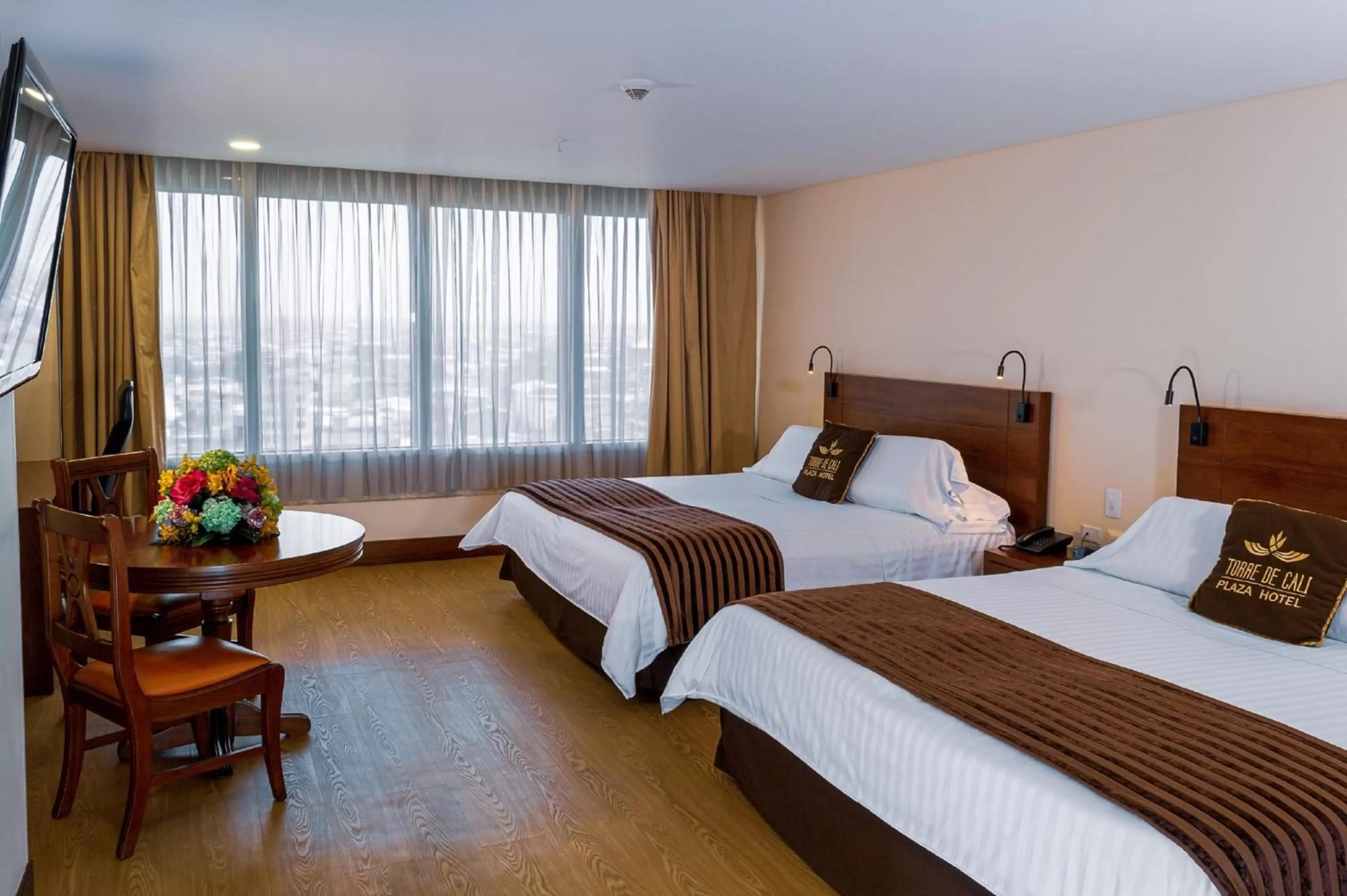 Bed in Torre de Cali Plaza Hotel