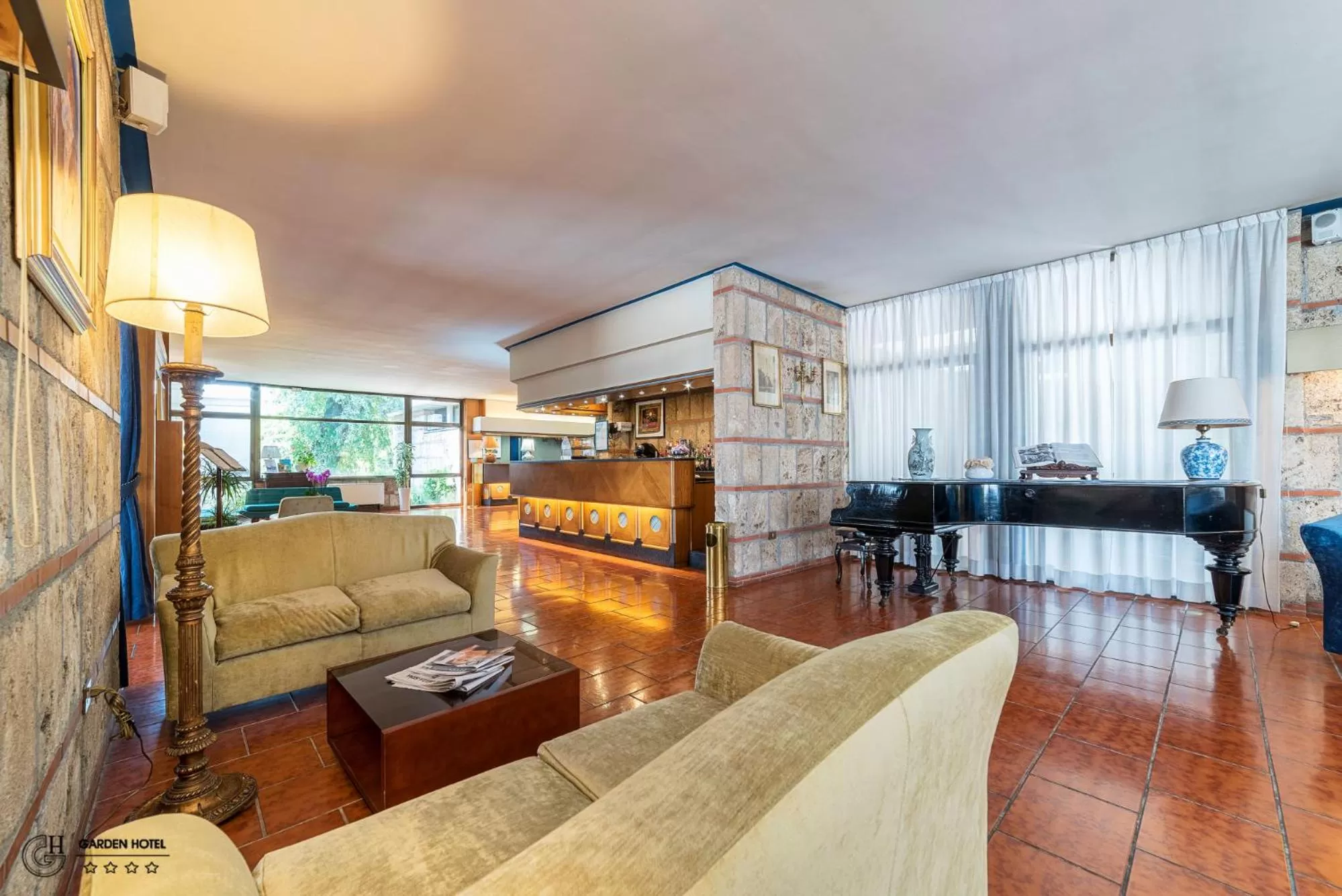 Communal lounge/ TV room in Hotel Garden Terni