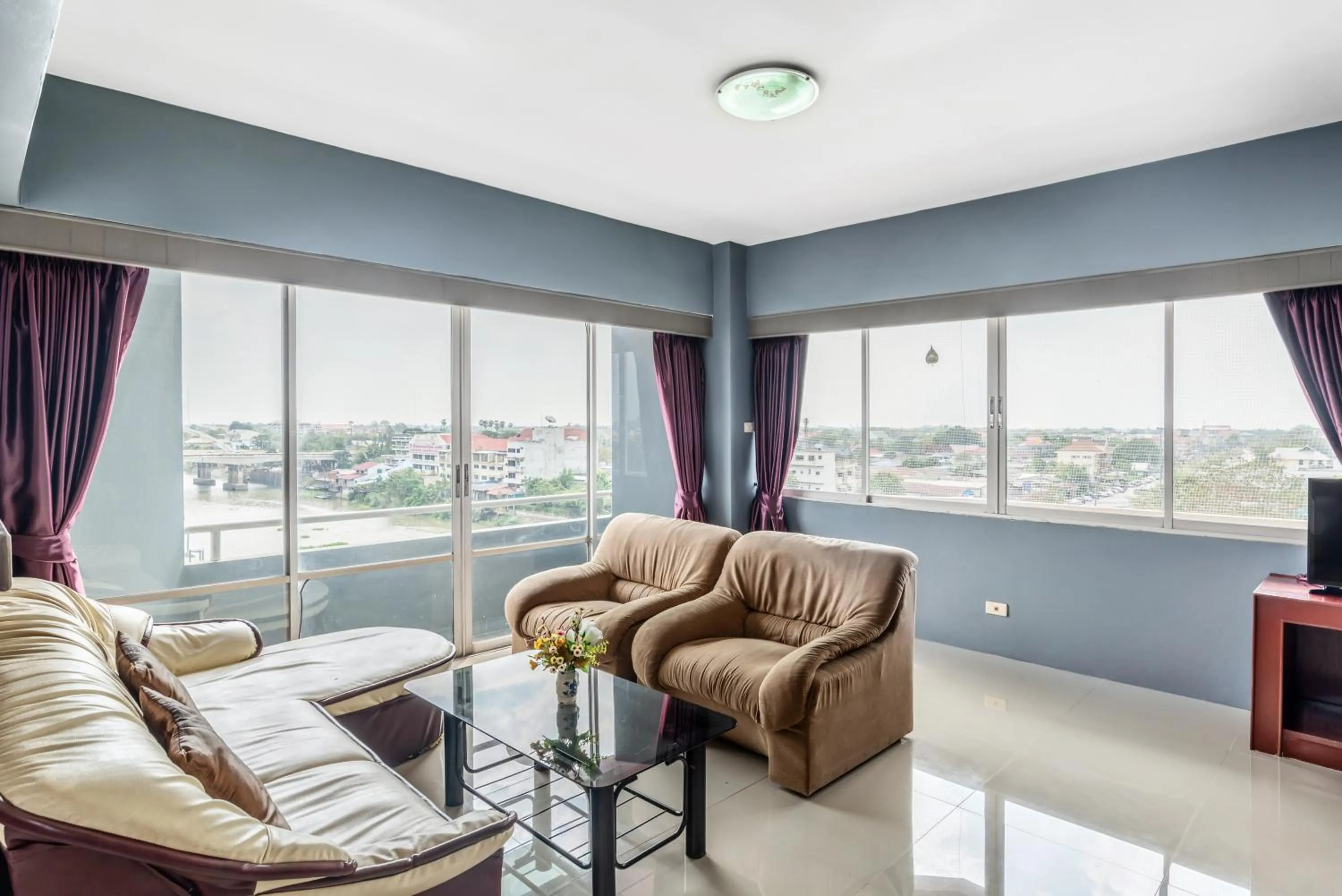 Living room in Ayothaya Riverside Hotel
