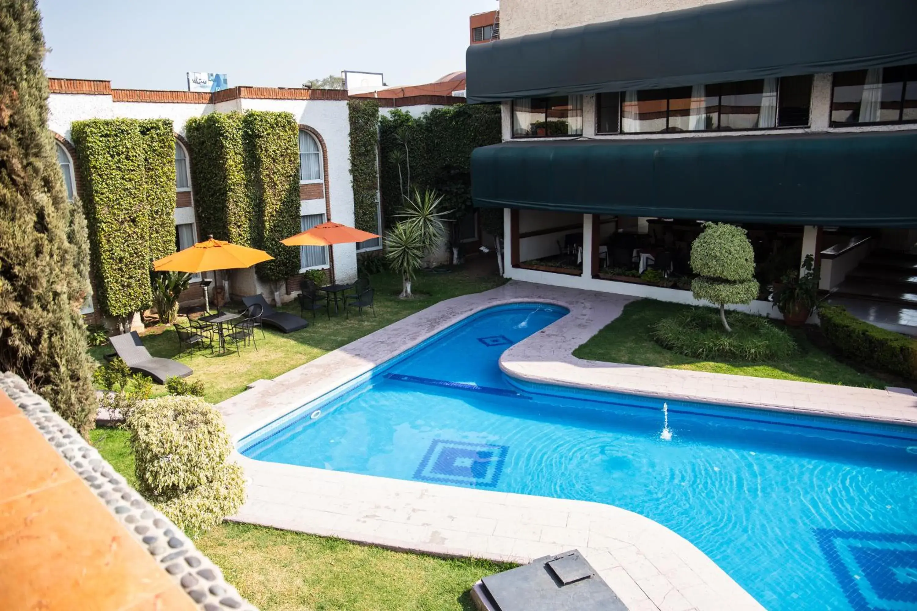 Swimming Pool in Hotel & Suites Villa del Sol