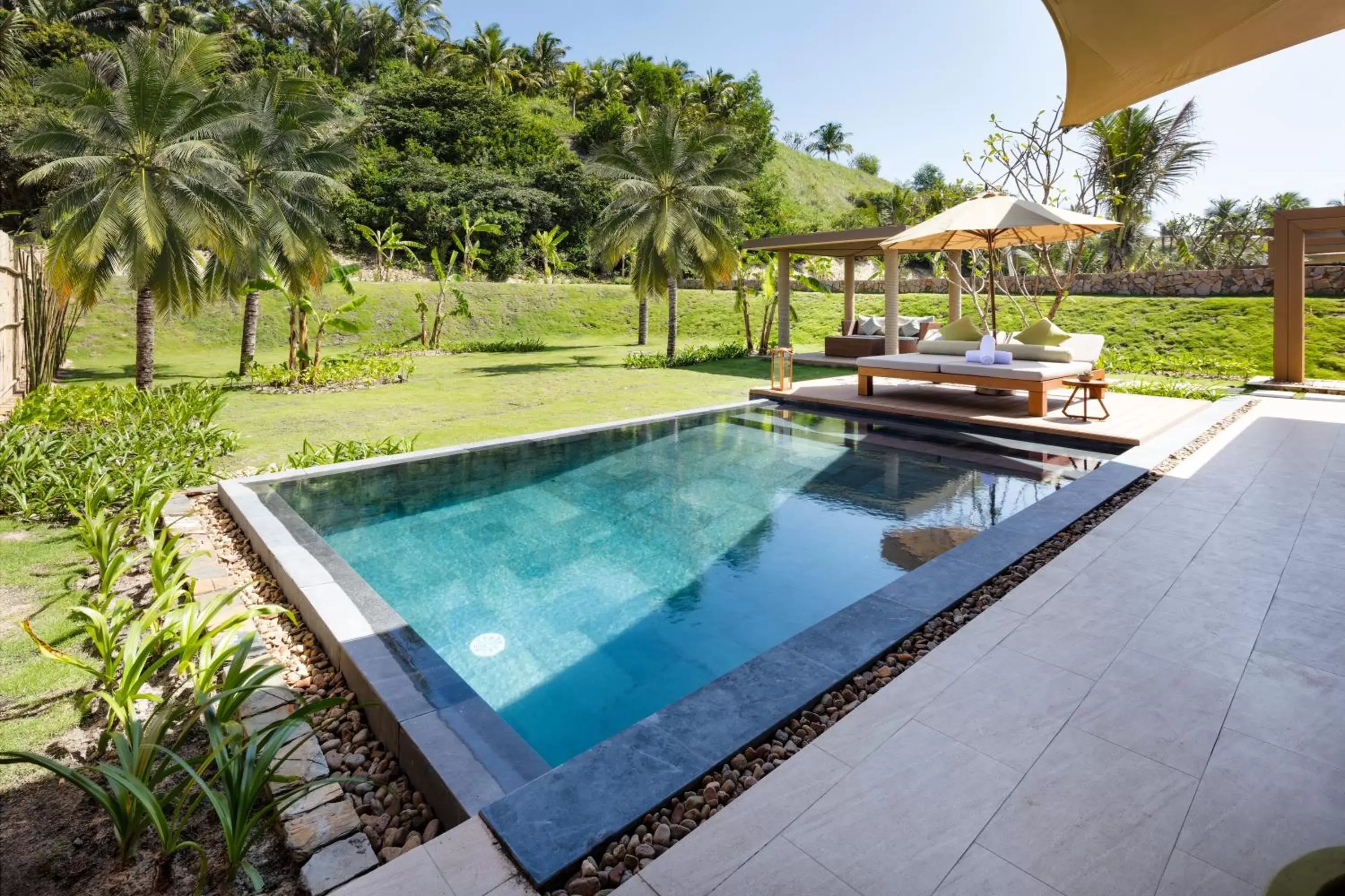 Patio, Swimming Pool in Fusion Resort Cam Ranh - All Spa Inclusive