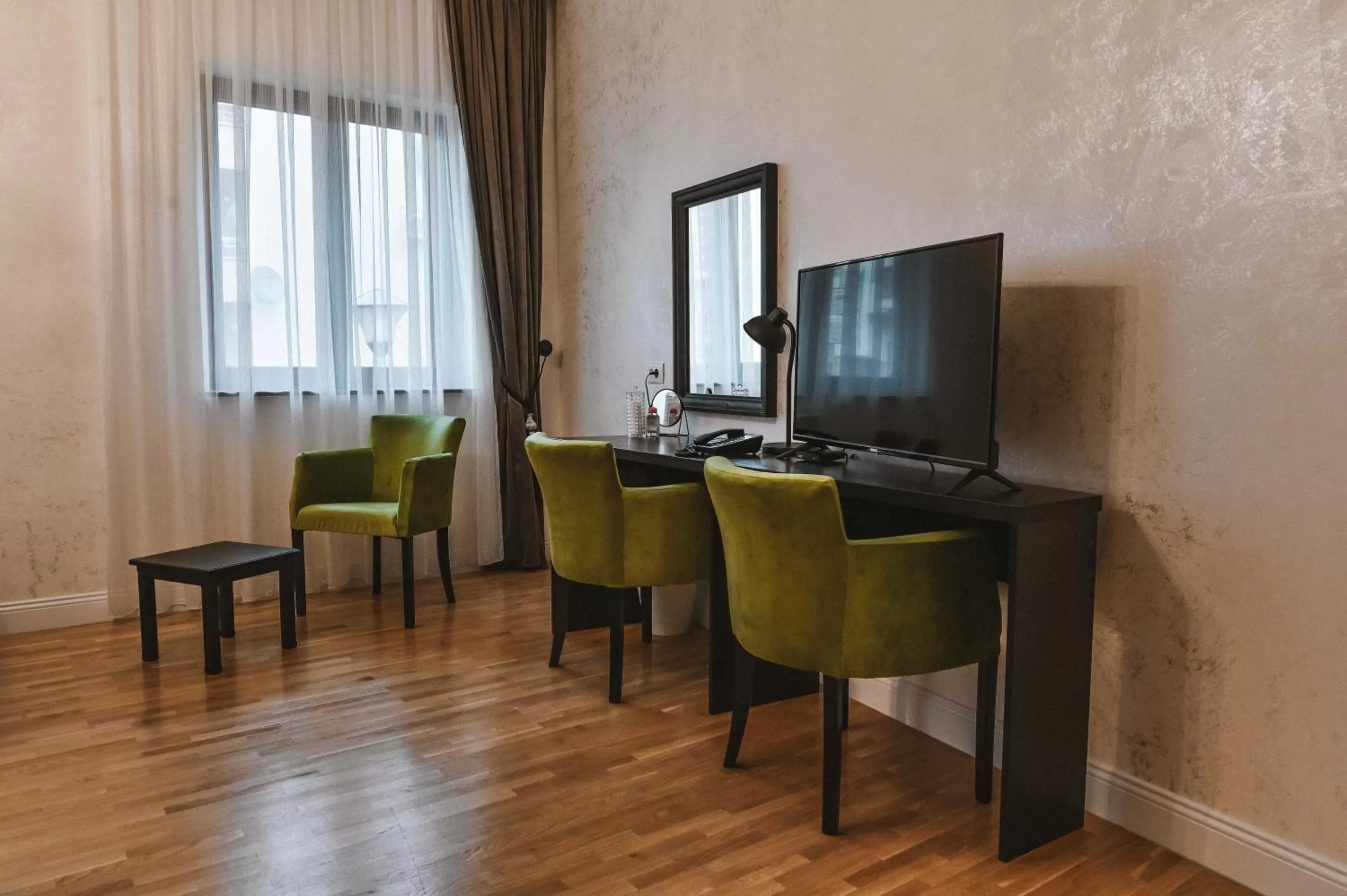TV and multimedia, TV/Entertainment Center in Garni hotel BARUT