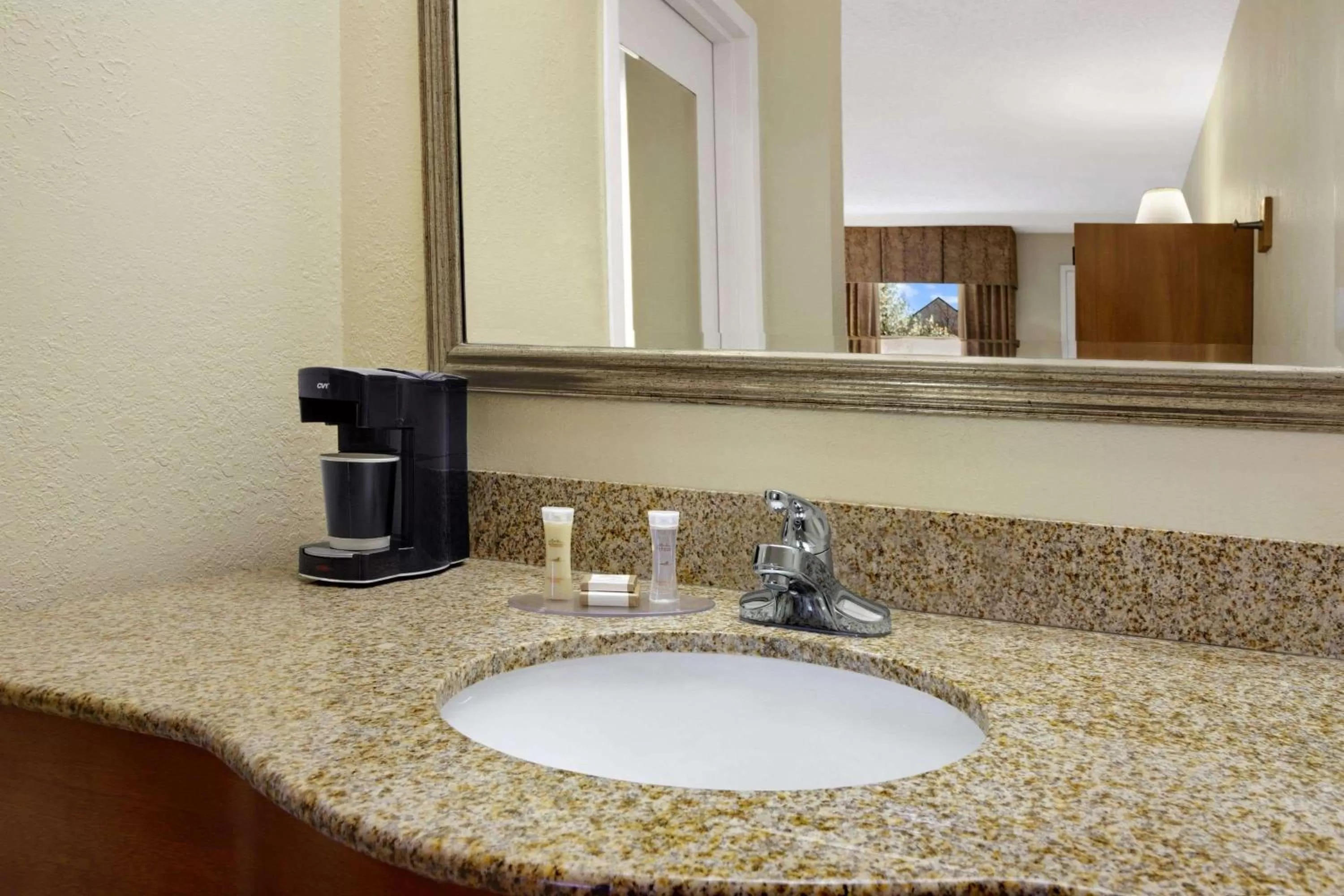 Bathroom in Howard Johnson by Wyndham Greensboro Near the Coliseum