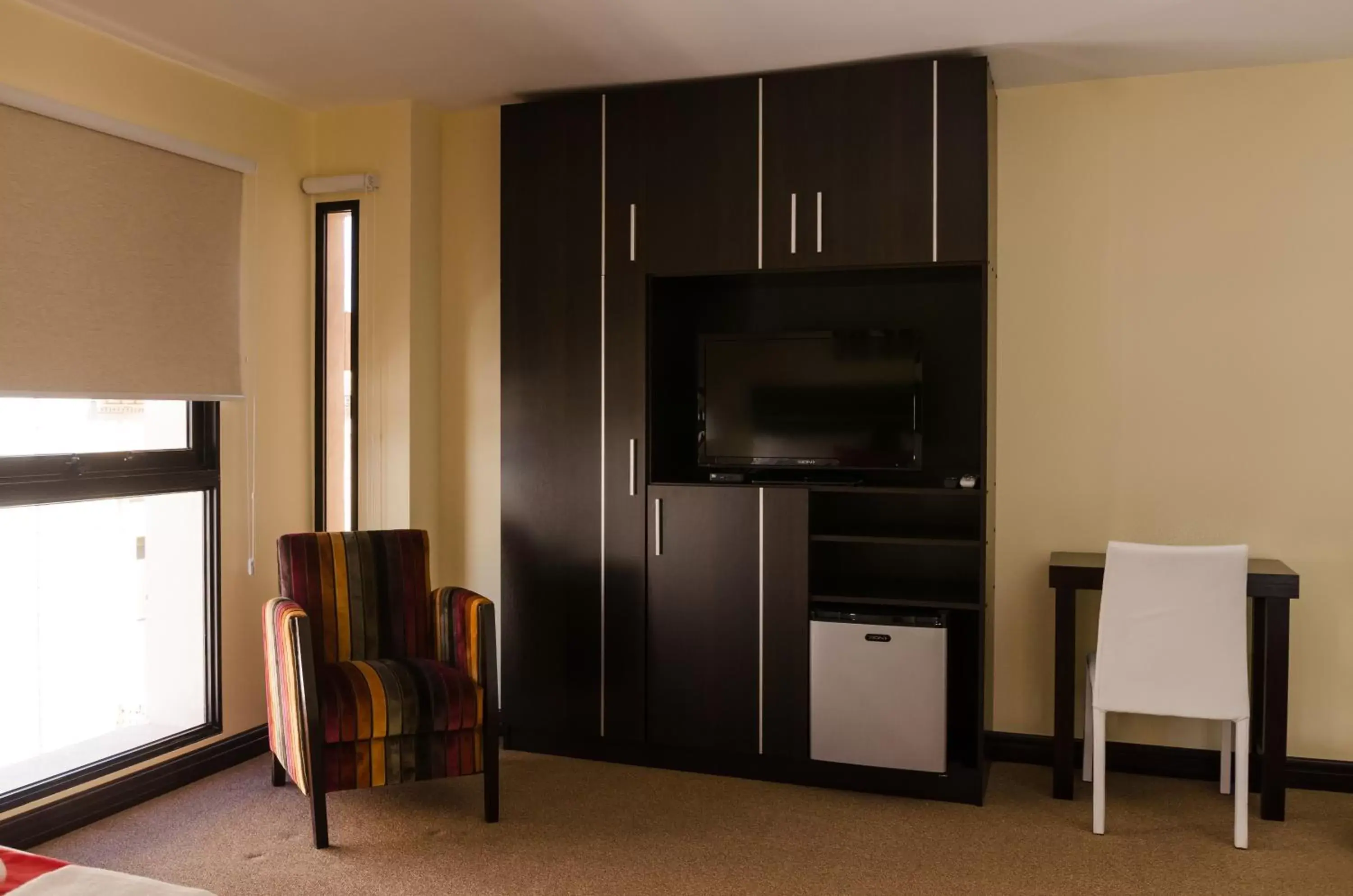 Bedroom, TV/Entertainment Center in Puerto Mercado Hotel