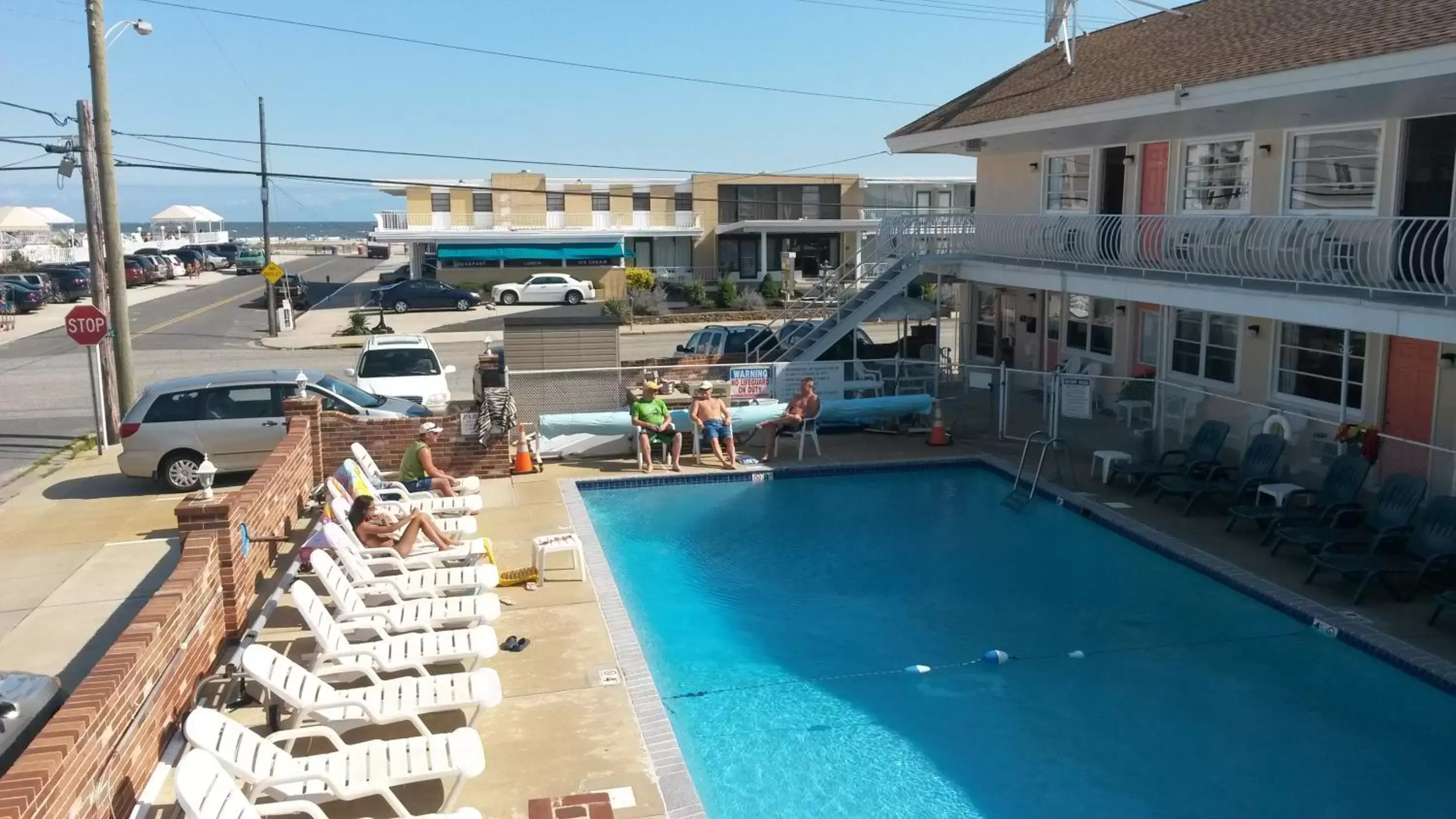 People, Pool View in Blue Water Motel