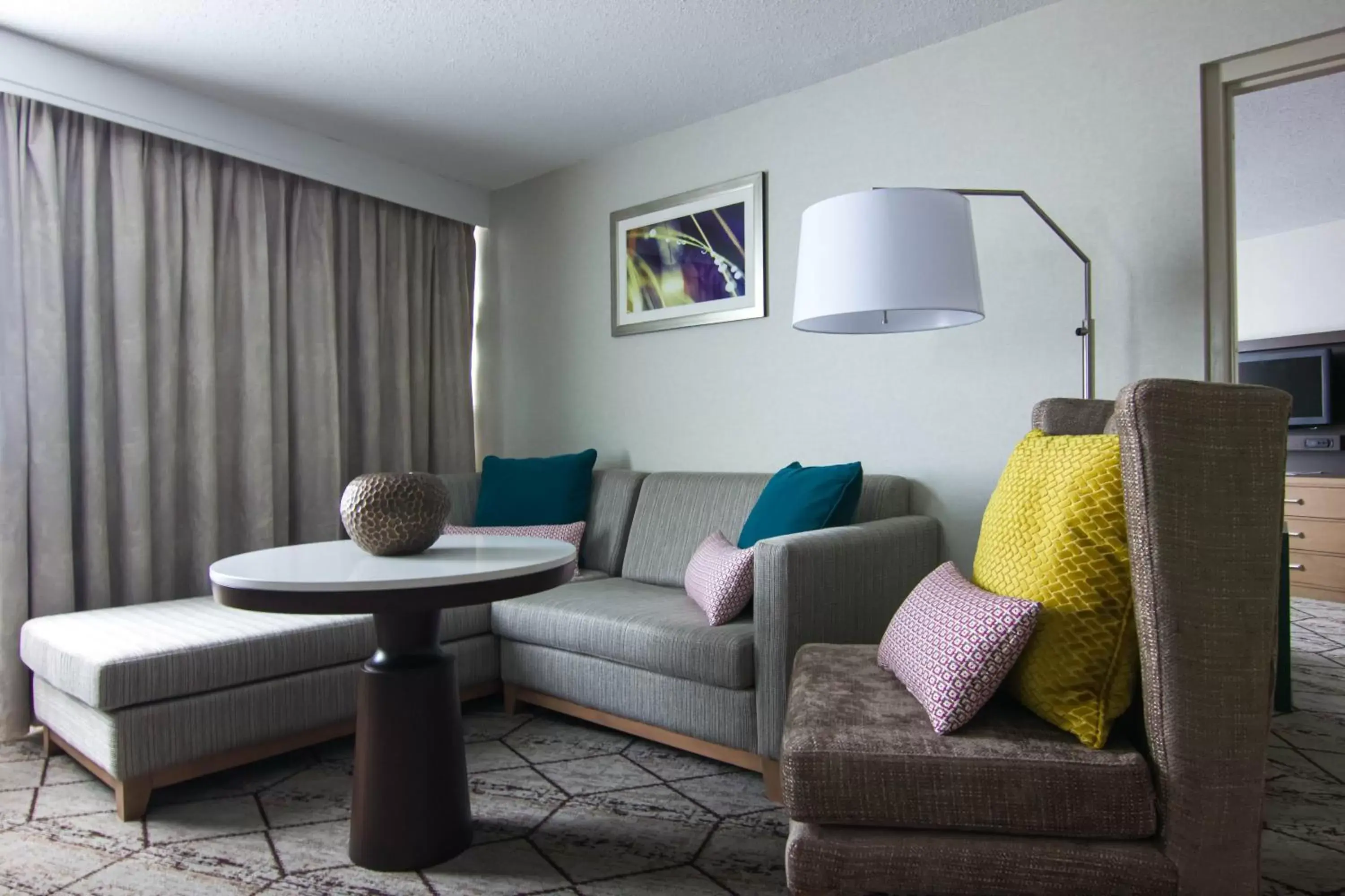 Photo of the whole room, Seating Area in Crowne Plaza Syracuse, an IHG Hotel