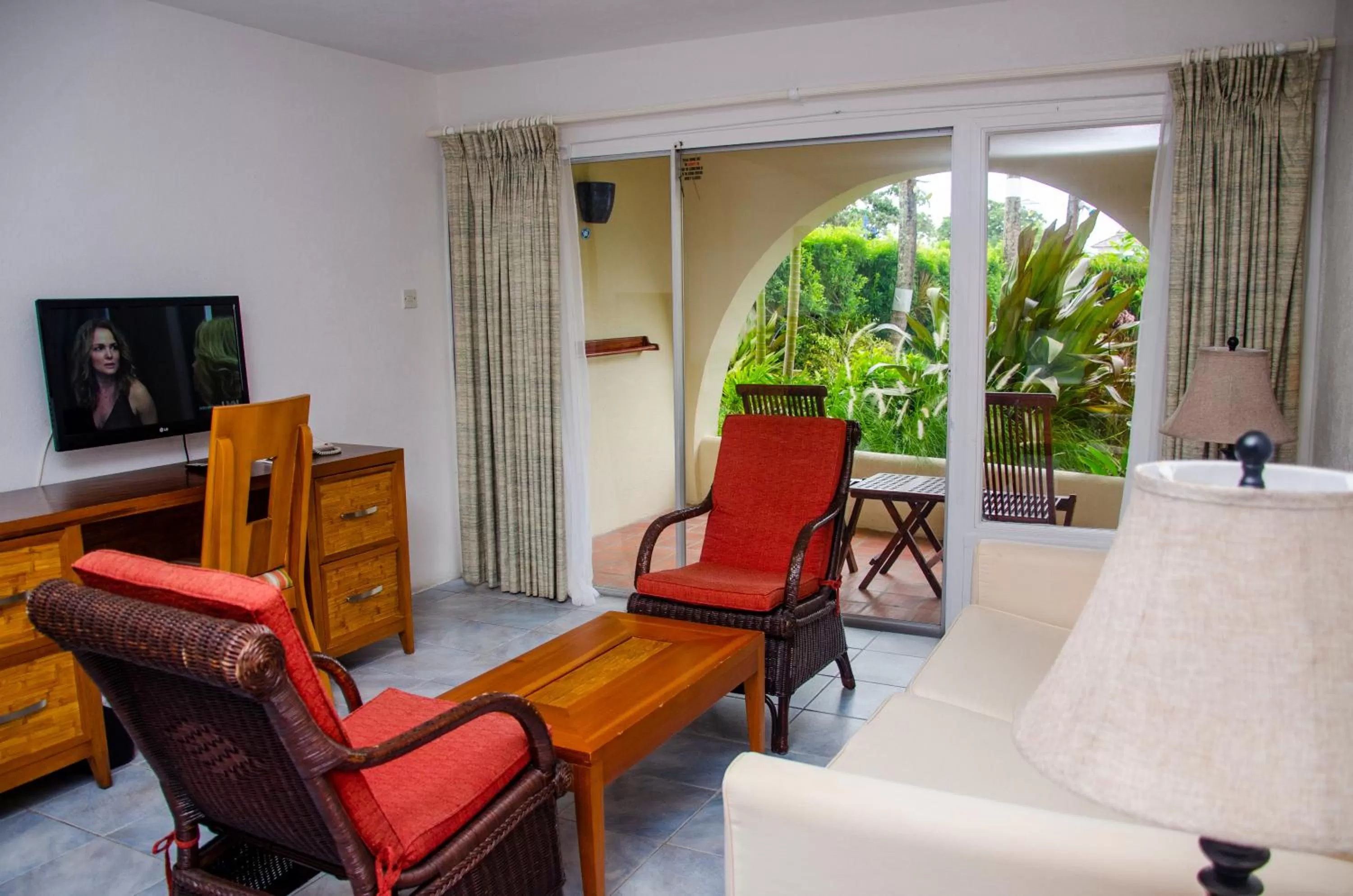 Communal lounge/ TV room, Seating Area in Infinity on the Beach