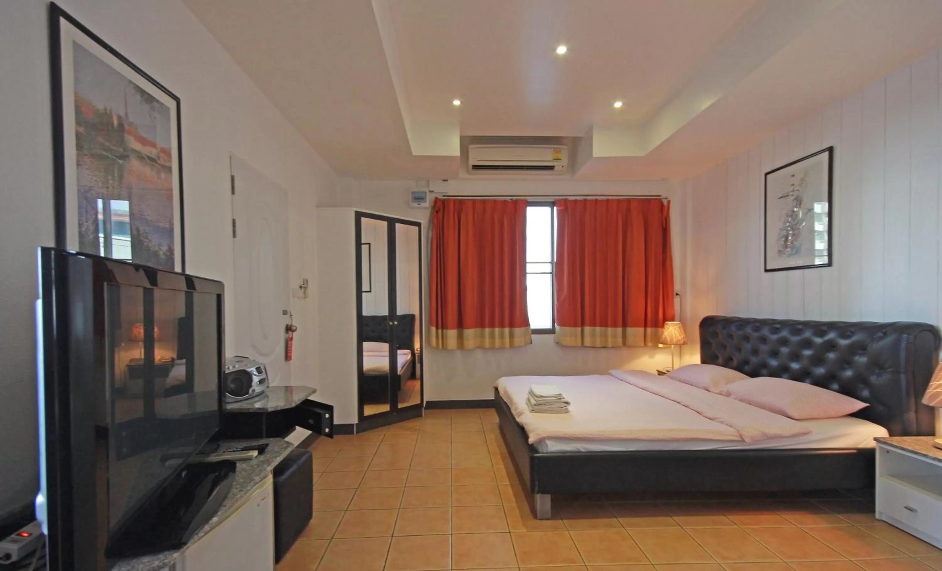 Photo of the whole room, Bed in Swiss Food Restaurant and room for rent