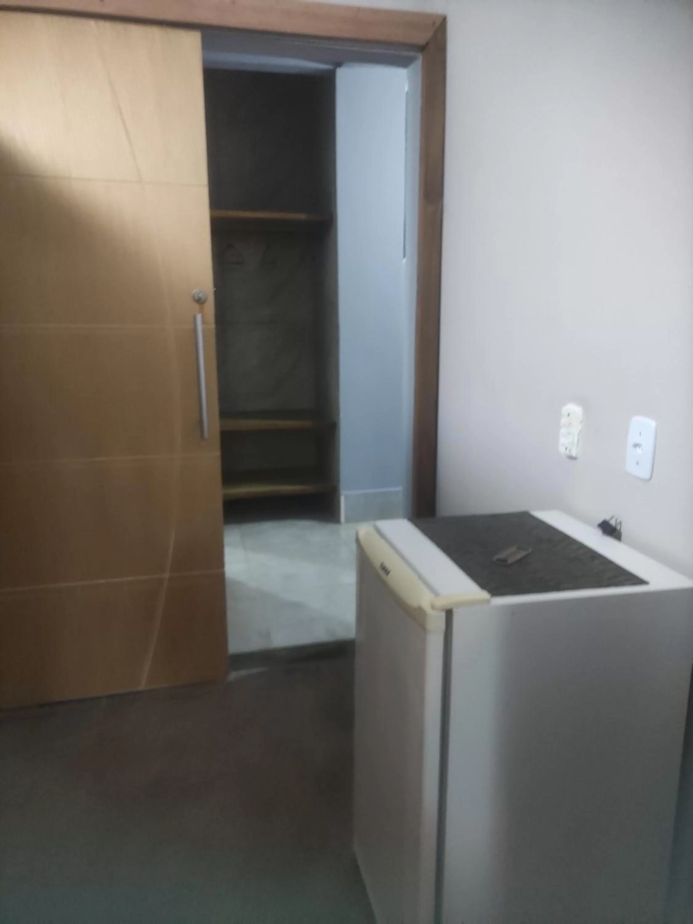 Bathroom in Pousada da Gi Suítes e Turismo