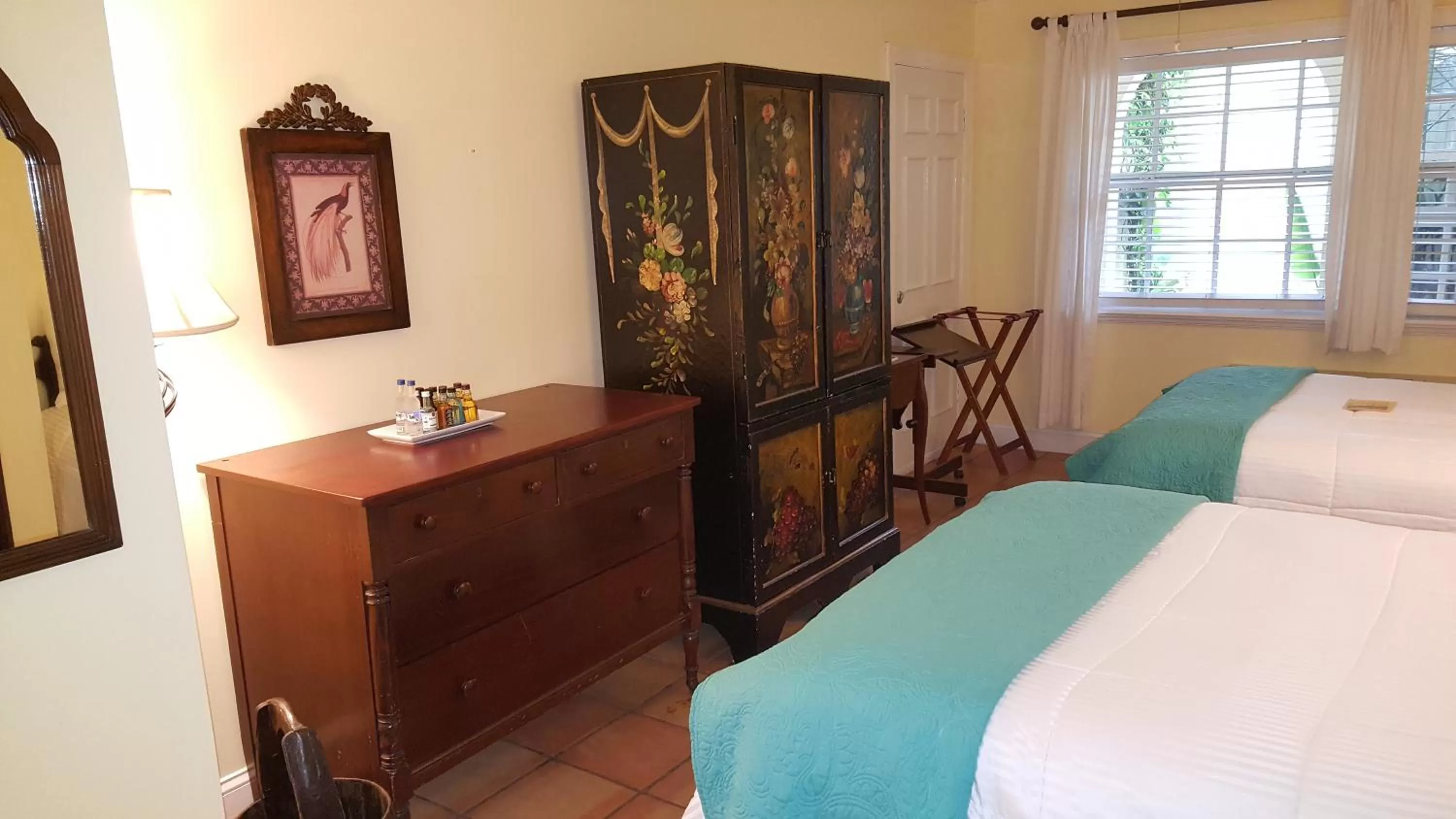 Photo of the whole room, Bed in The Caribbean Court Boutique Hotel