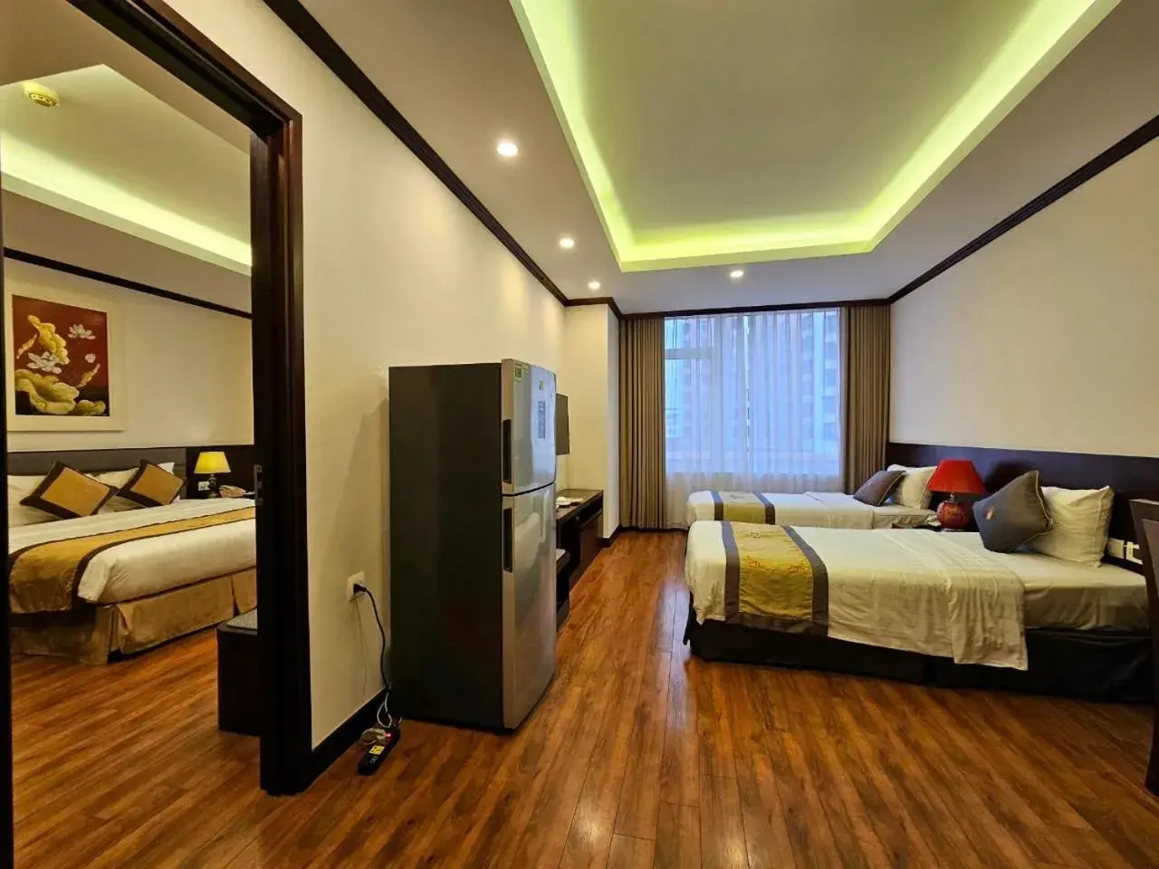 Photo of the whole room, Bed in Lenid Hotel Tho Nhuom