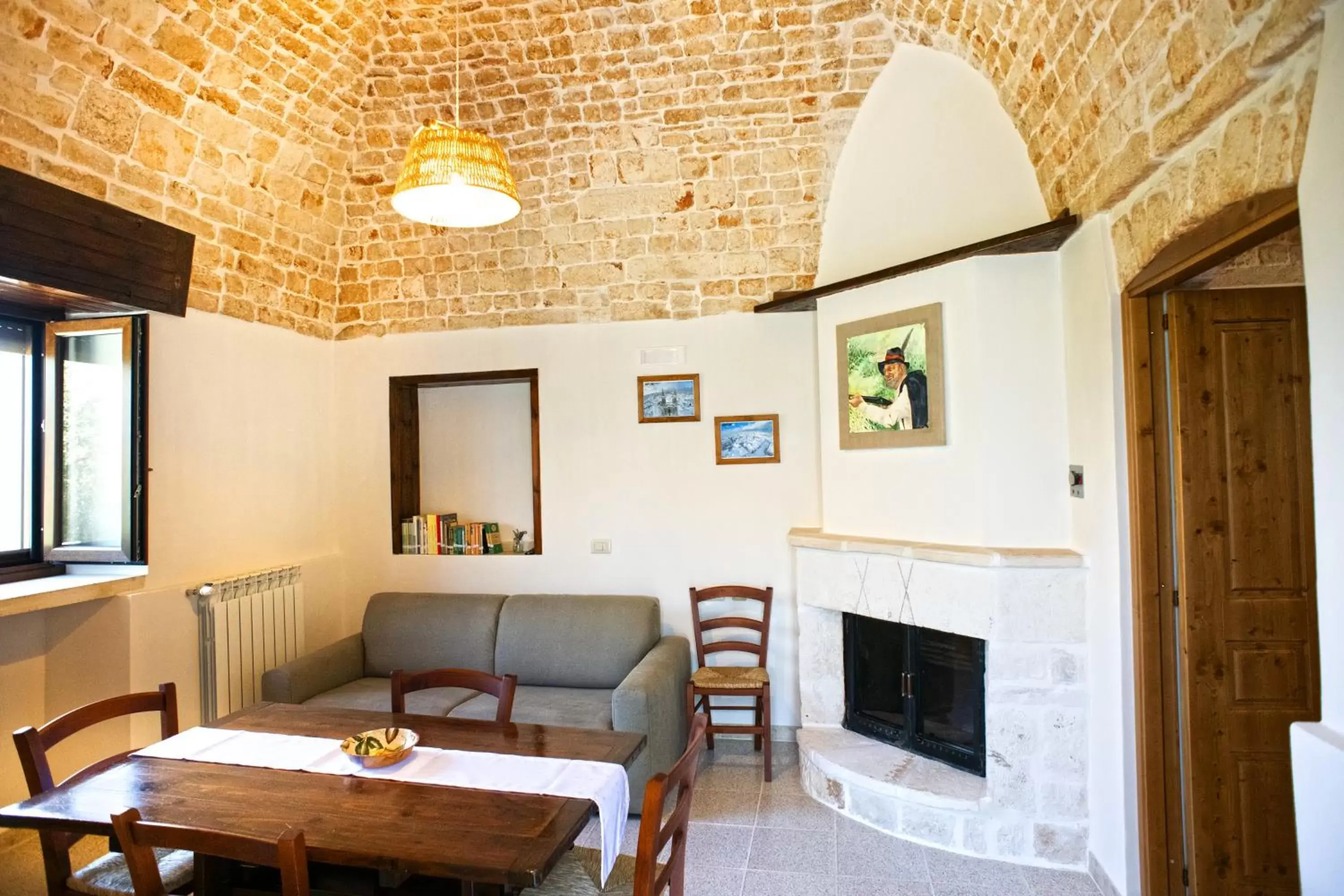 Bed, Seating Area in B&B Il Brigante