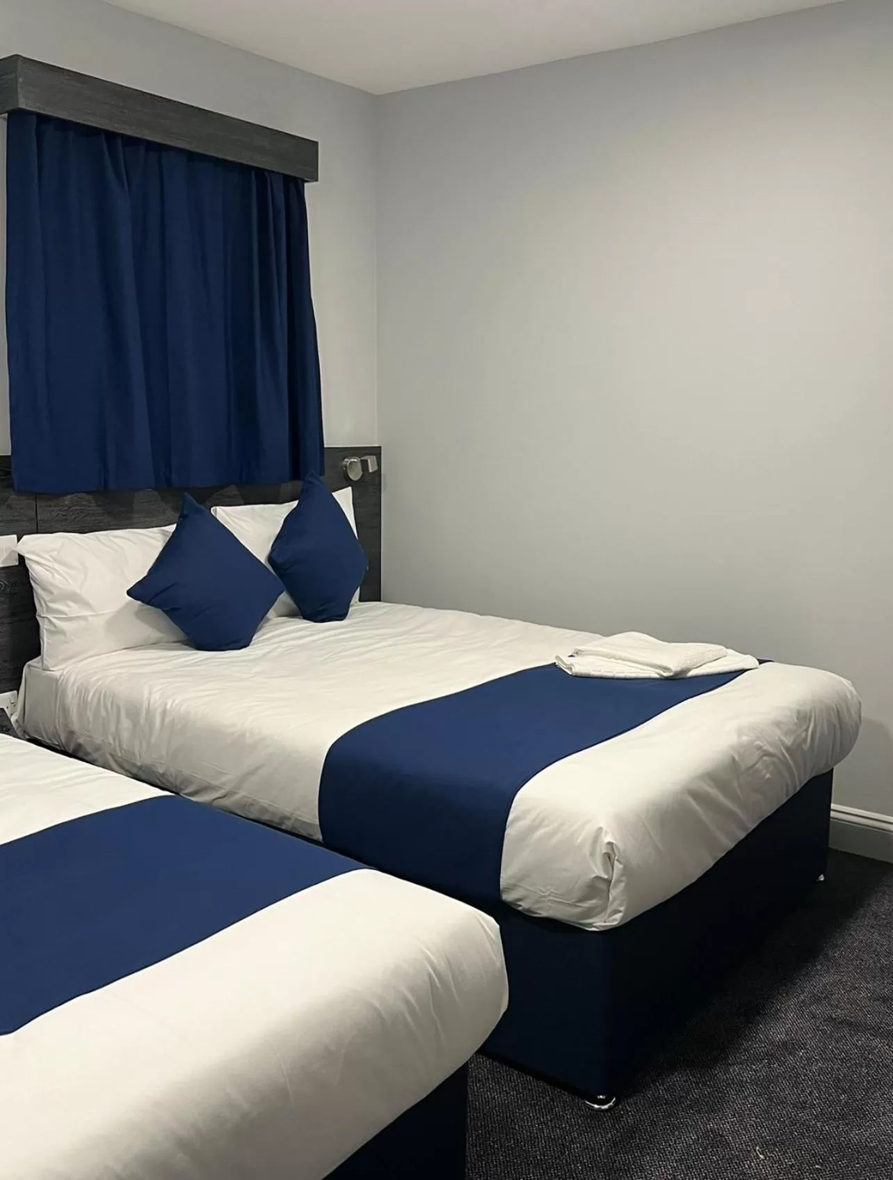 Bed in Blue Sapphire Hotel