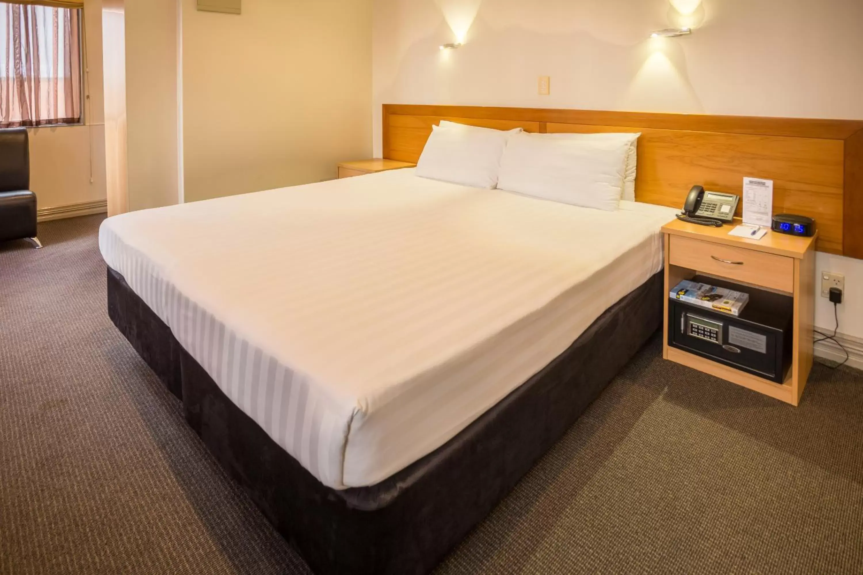 Bed in President Hotel Auckland