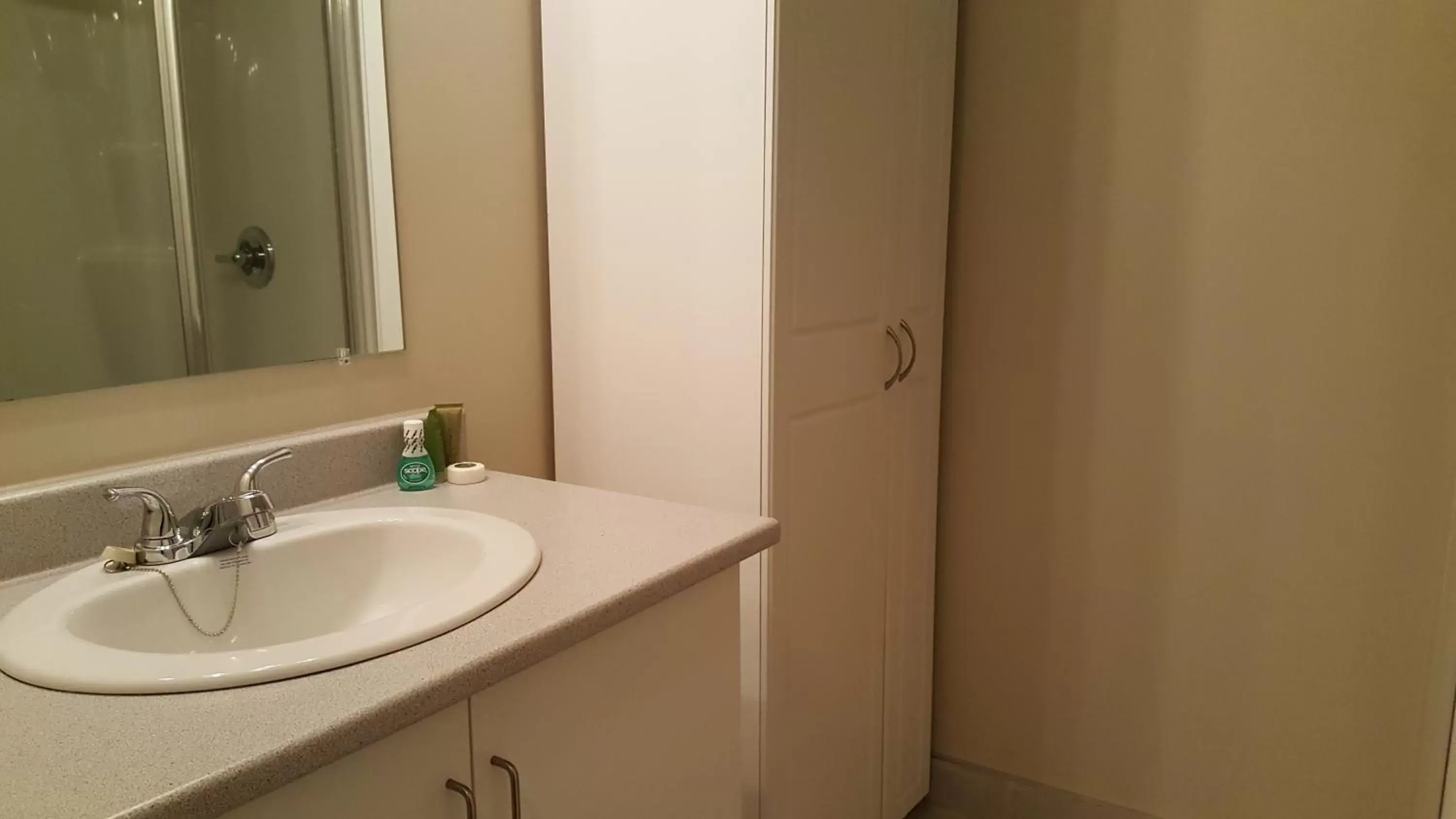 Bathroom in Duvernay Studios and Suites Bathroom in Duvernay Studios and Suites