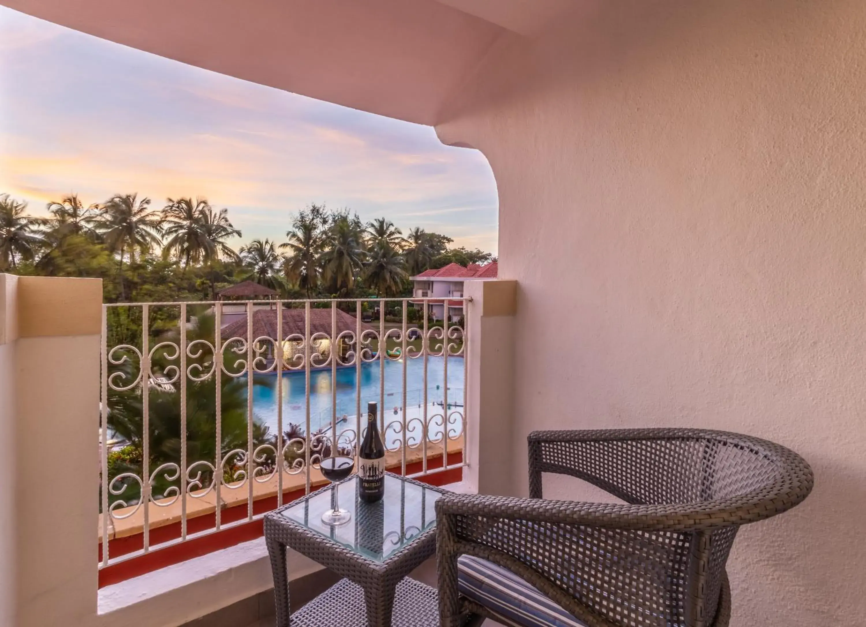 Balcony/Terrace, Pool View in Heritage Village Resort & Spa Goa