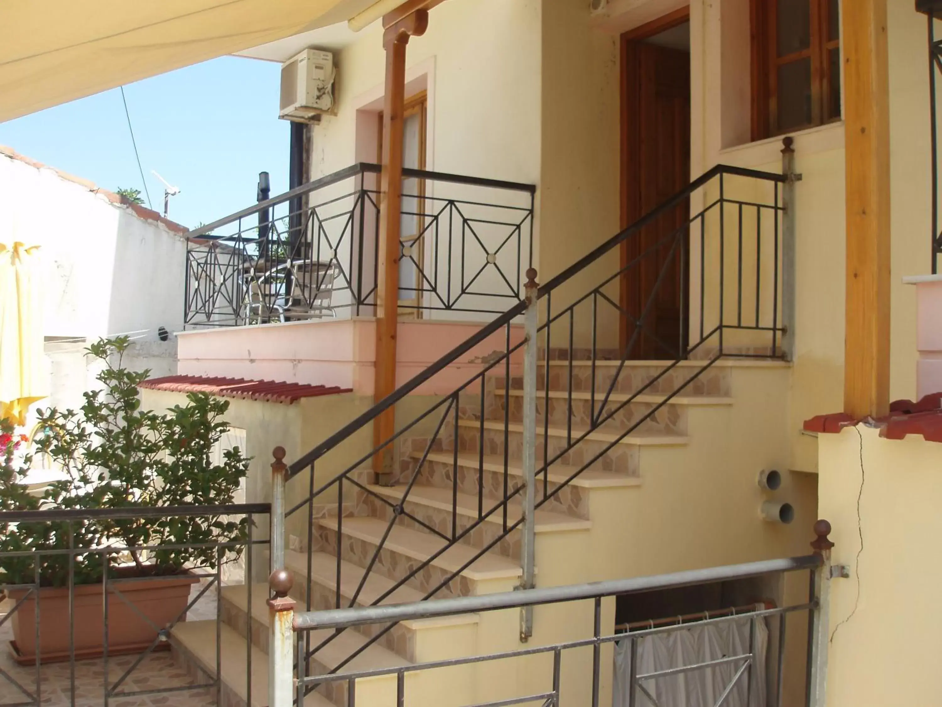 Property building, Balcony/Terrace in skiathos studios HL