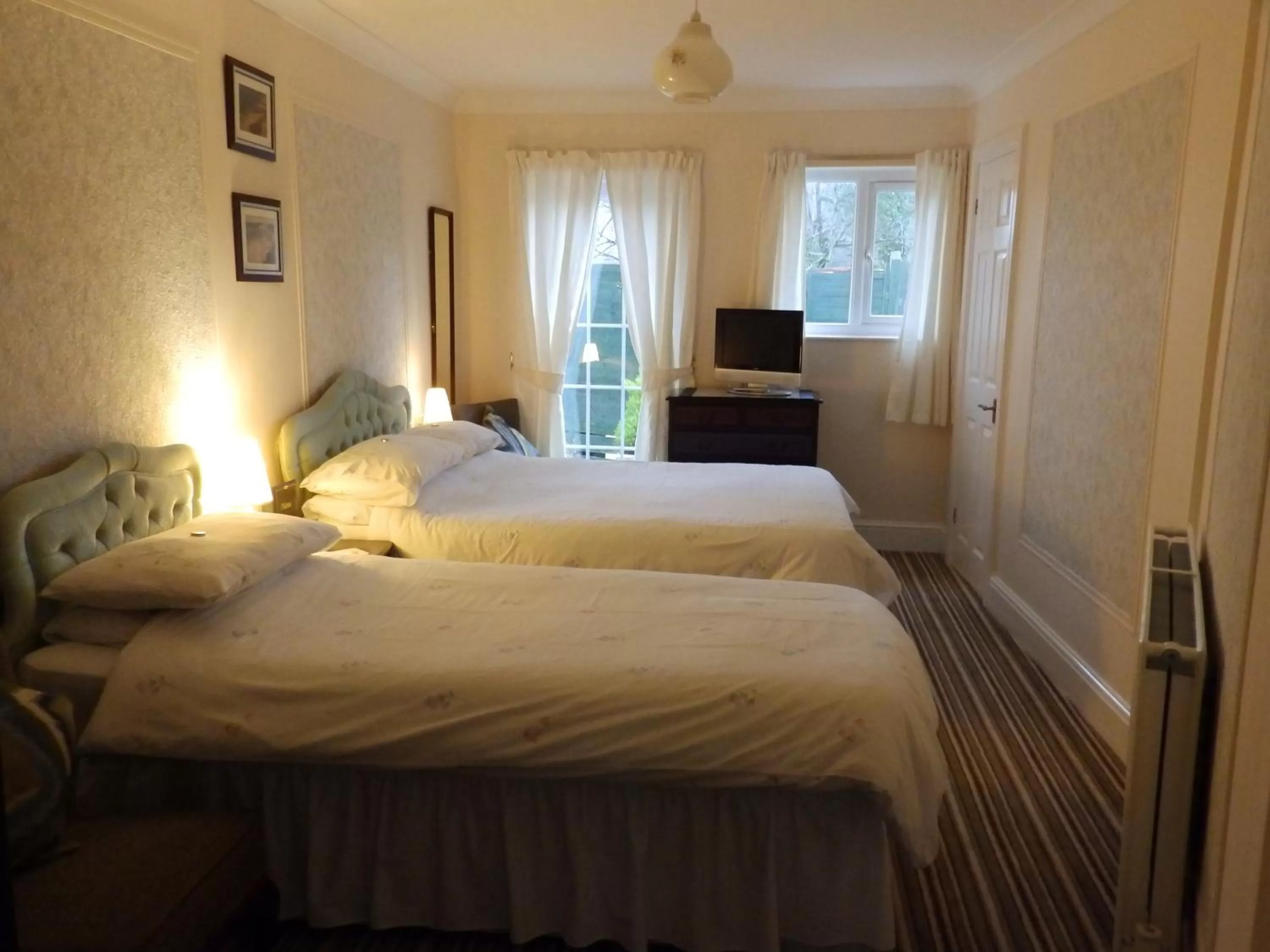 Bed in Rosedene Guest House