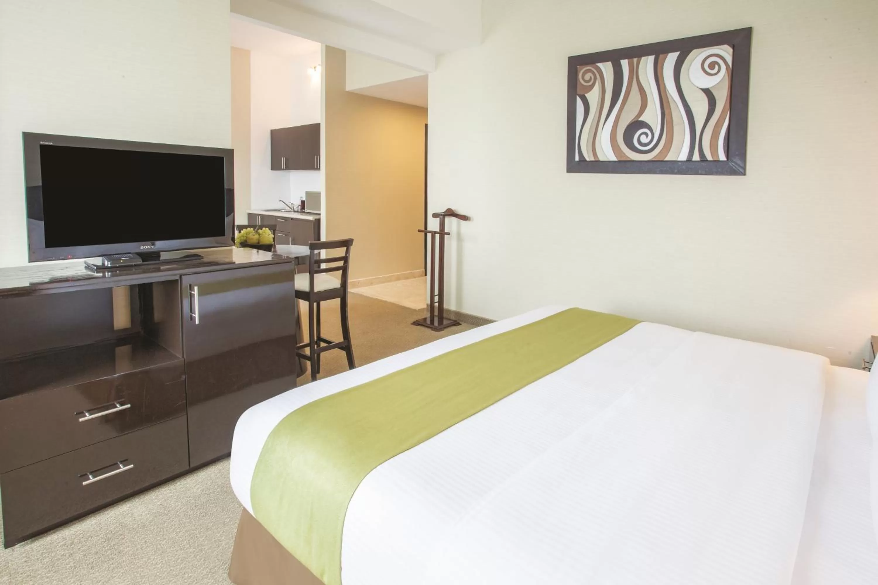 Bedroom, TV/Entertainment Center in La Quinta by Wyndham Poza Rica