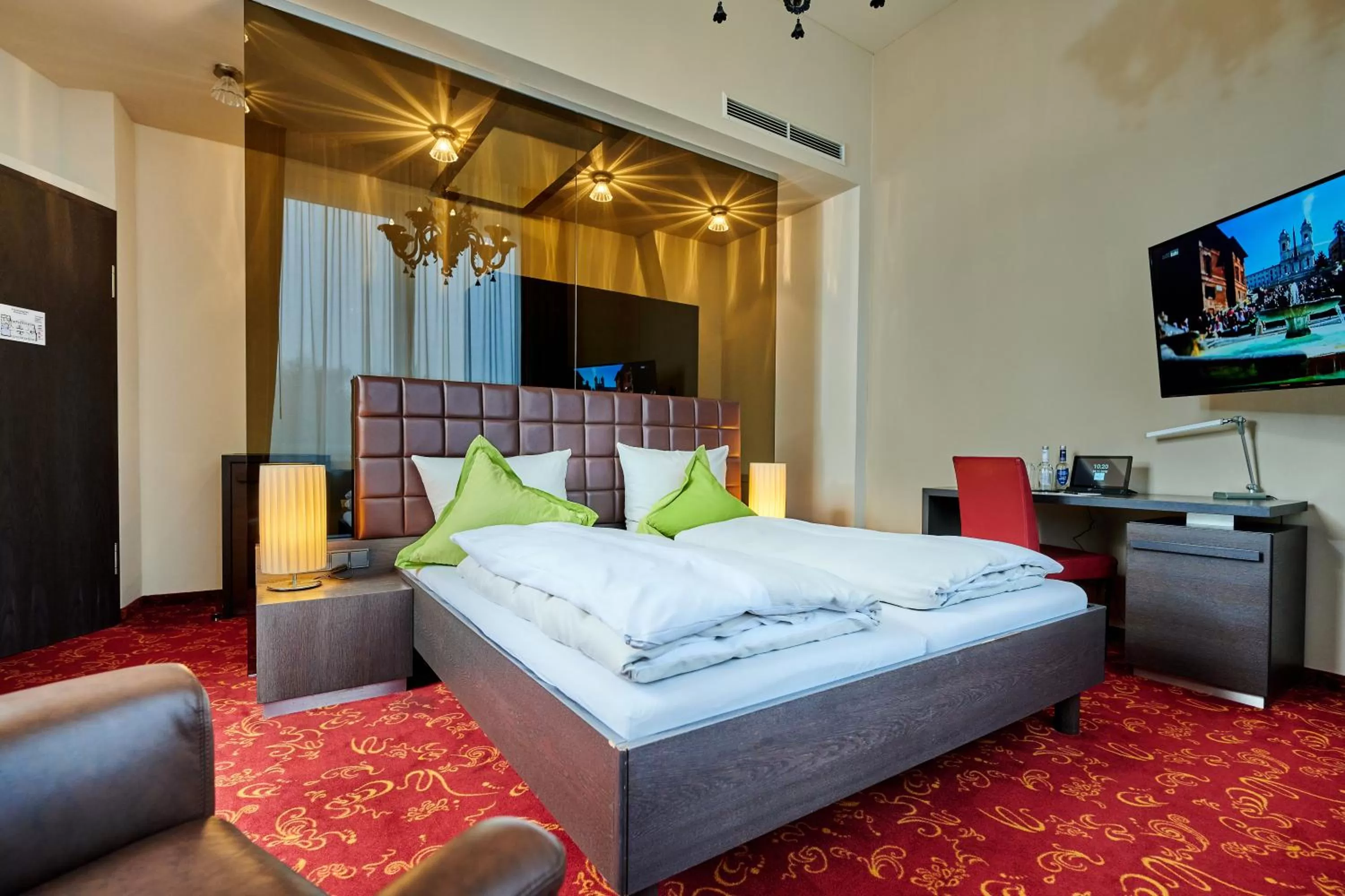 Photo of the whole room, Bed in Genusshotel Wenisch