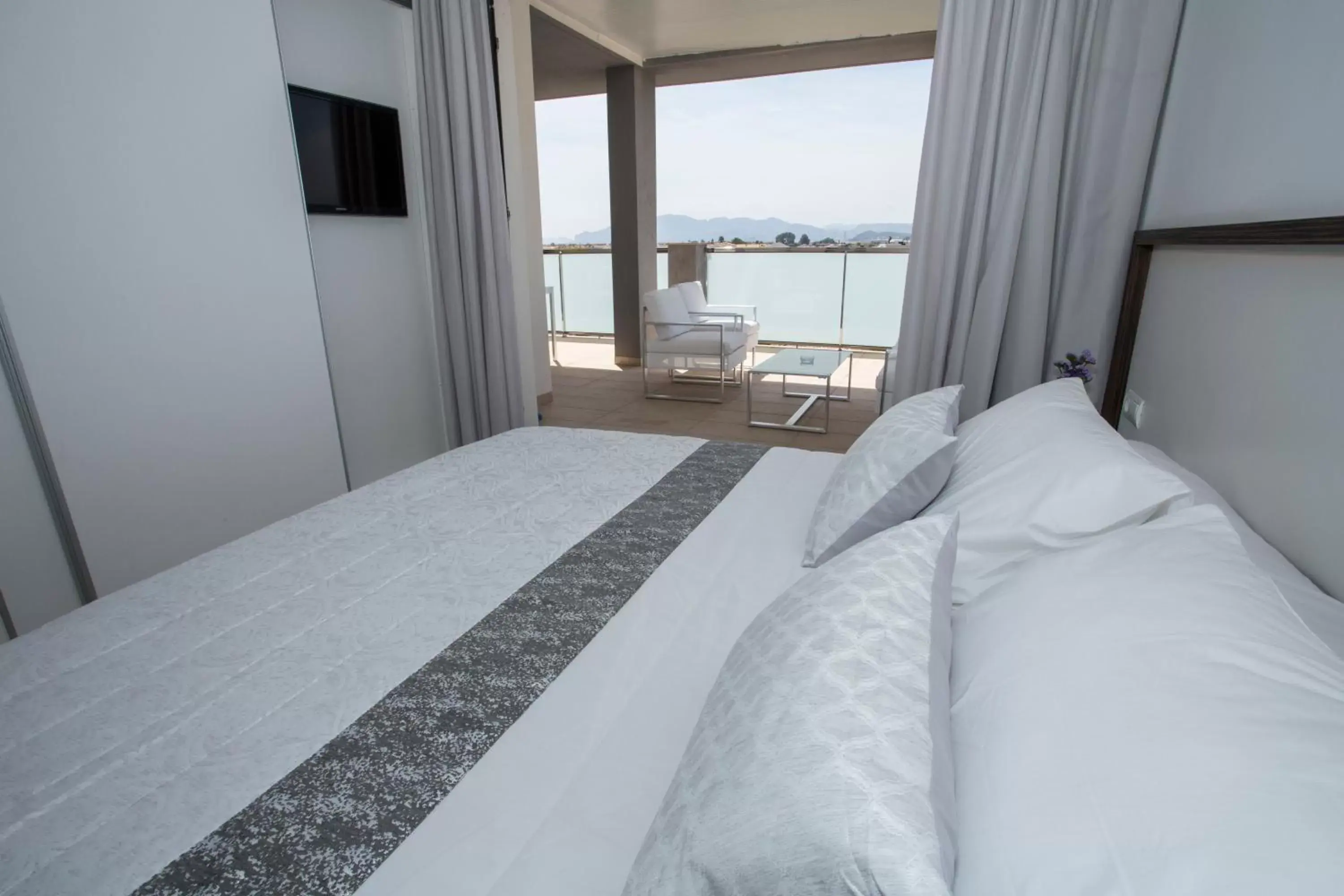 Bed in ApartHotel Playa Oliva