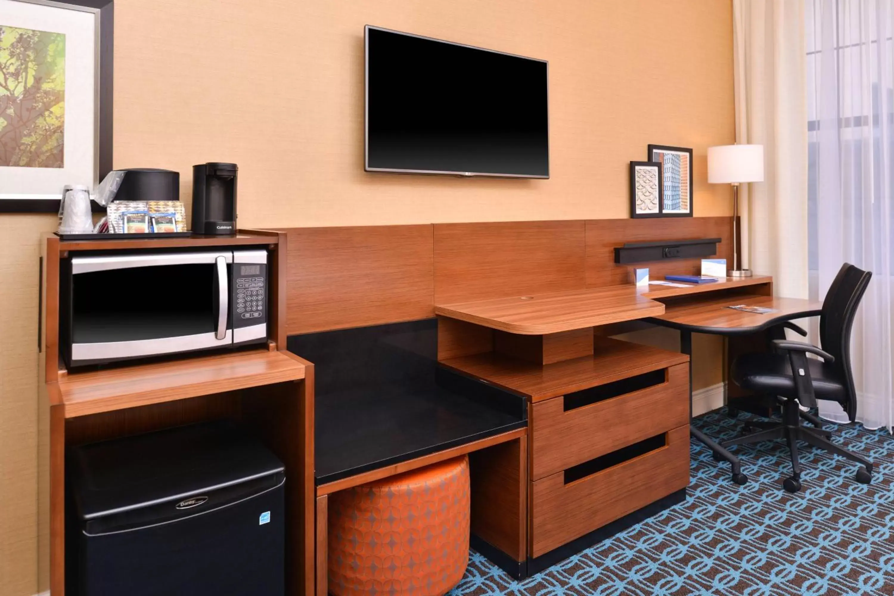 Photo of the whole room, TV/Entertainment Center in Fairfield Inn & Suites by Marriott Albany Downtown