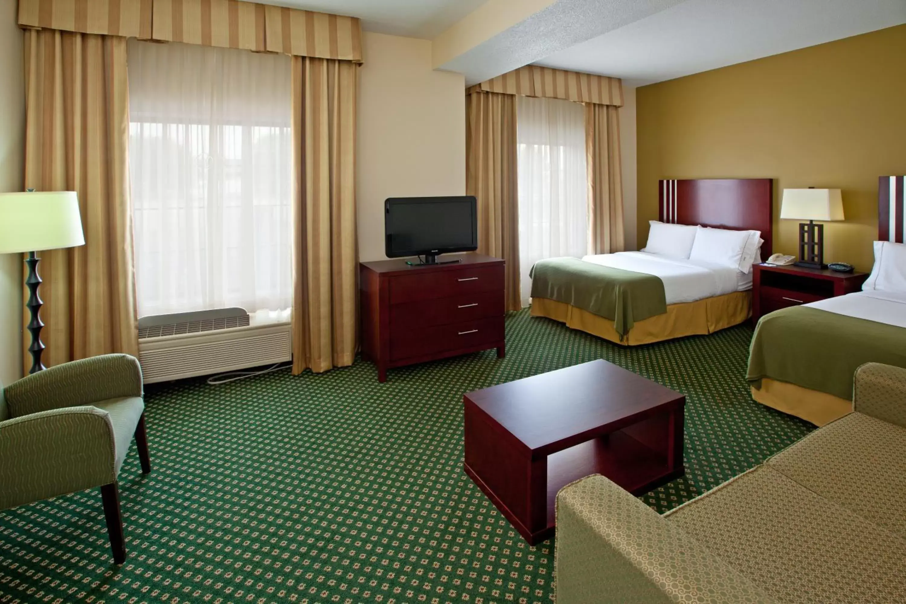 Photo of the whole room, TV/Entertainment Center in Holiday Inn Express Hotel & Suites Indianapolis - East, an IHG Hotel