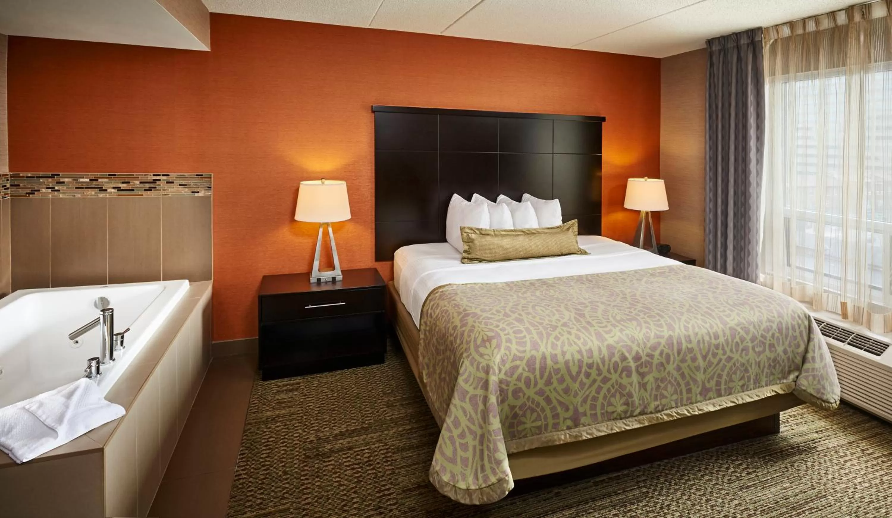 Photo of the whole room, Bed in Staybridge Suites Hamilton - Downtown by IHG