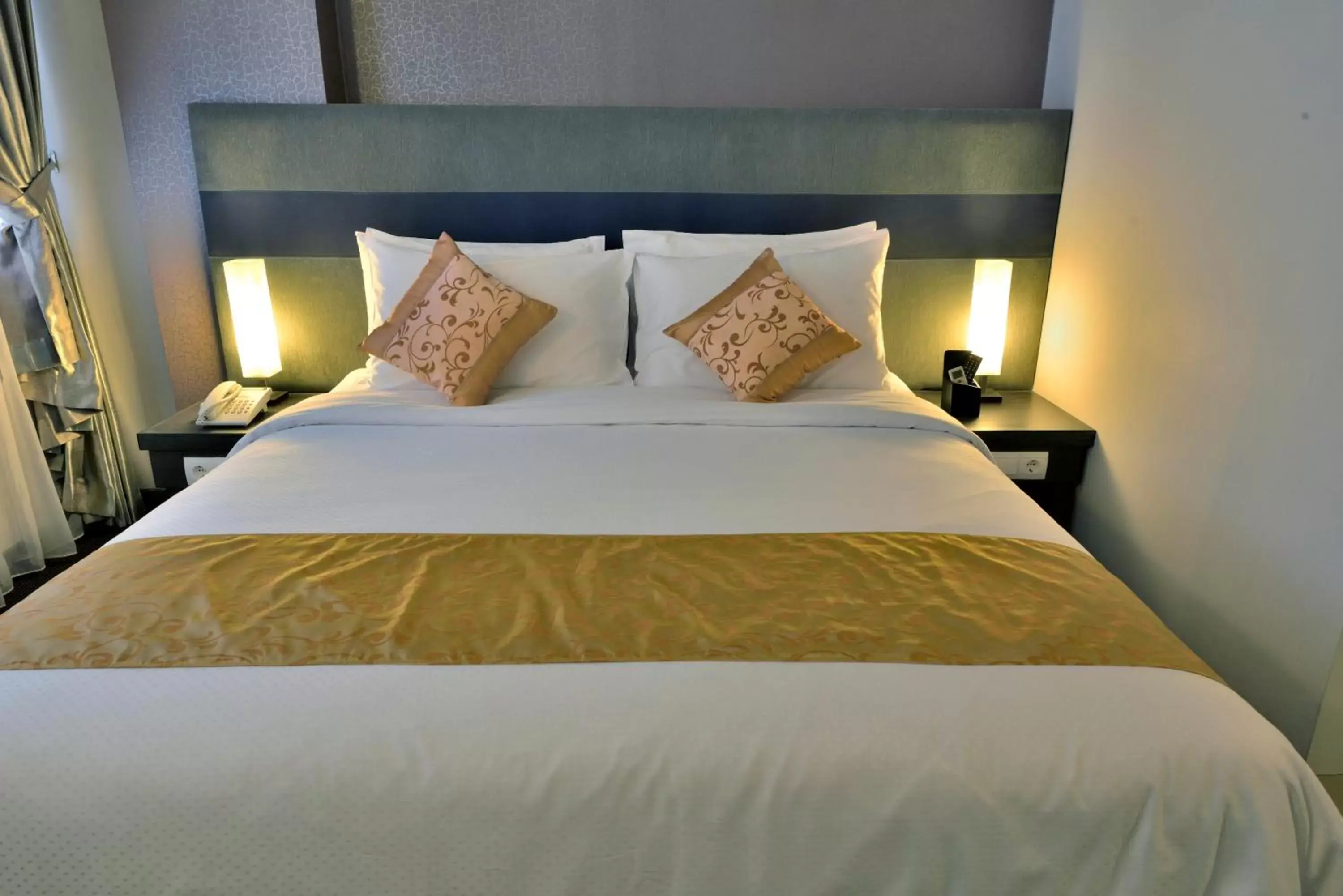 Bed in Tjokro Hotel Pekanbaru