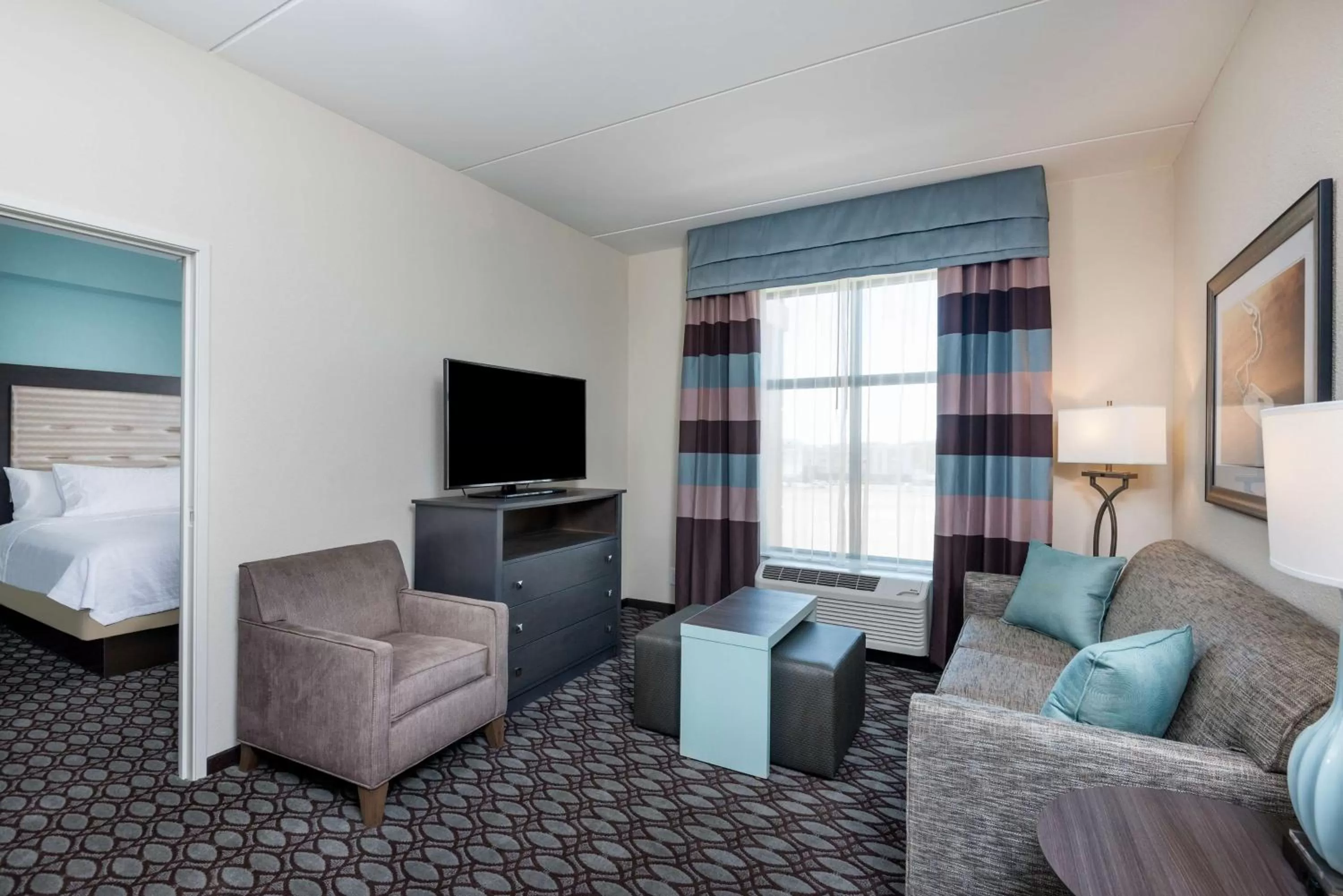 Living room, Bed in Homewood Suites By Hilton Fayetteville