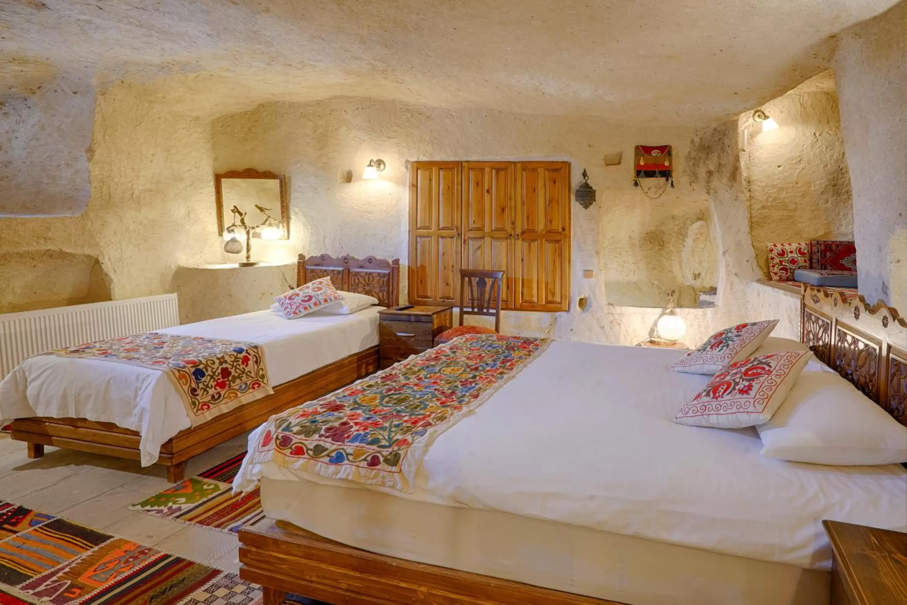 Bed in Tulip Cave Suites