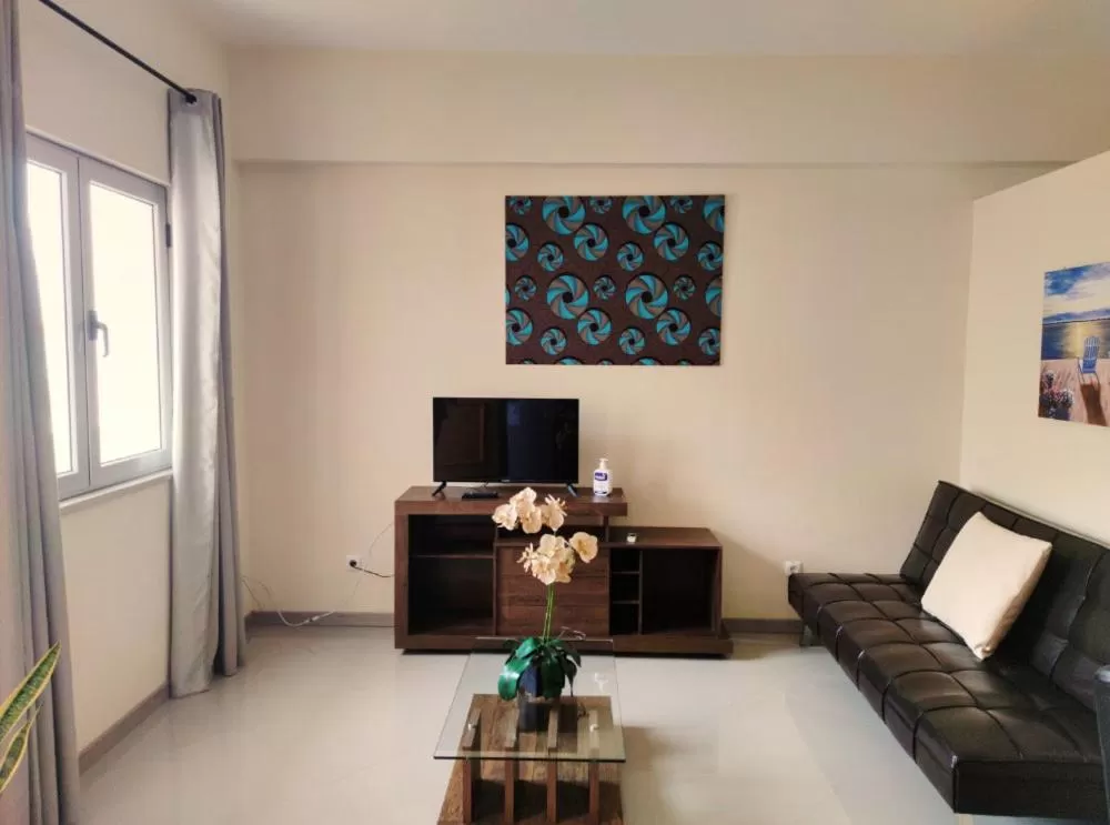 TV and multimedia, Seating Area in Praia Capital Residence